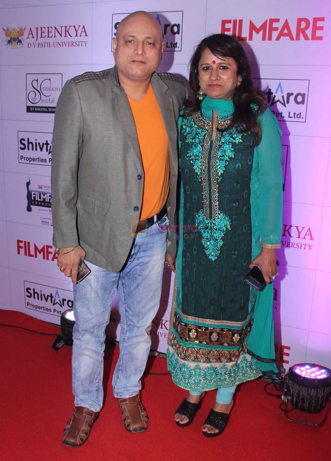Manoj Joshi with wife at the Red Carpet of _Ajeenkya DY Patil University Filmfare Awards