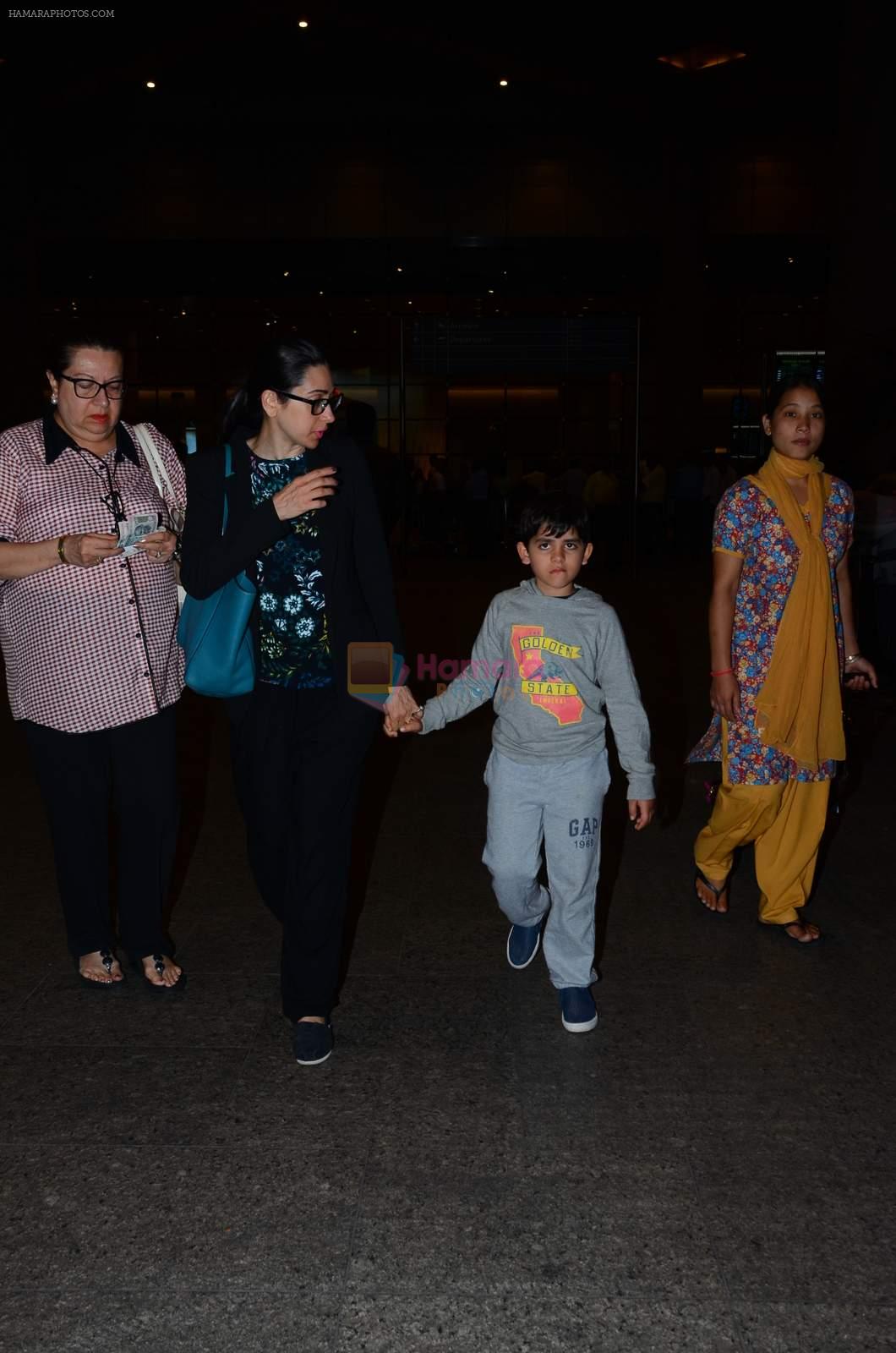 Karisma Kapoor, Babita snapped at airport on 1st Jan 2016