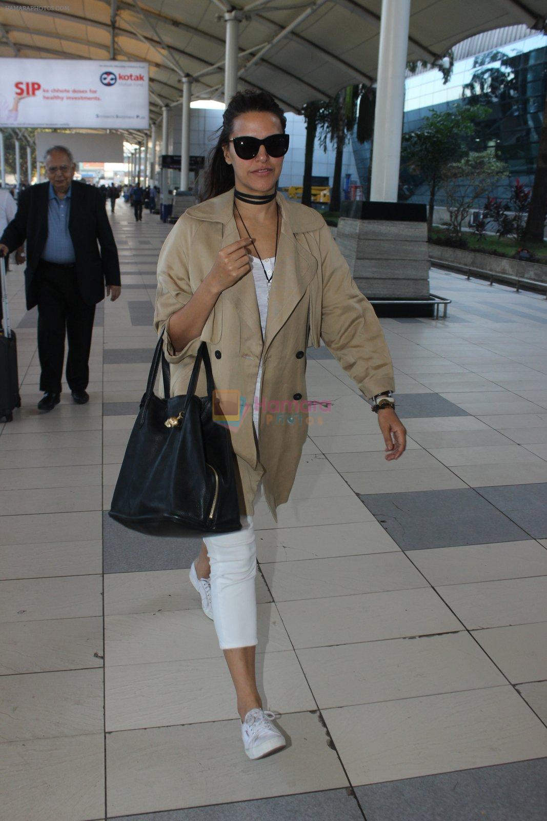 Neha Dhupia snapped at airport on 10th March 2016