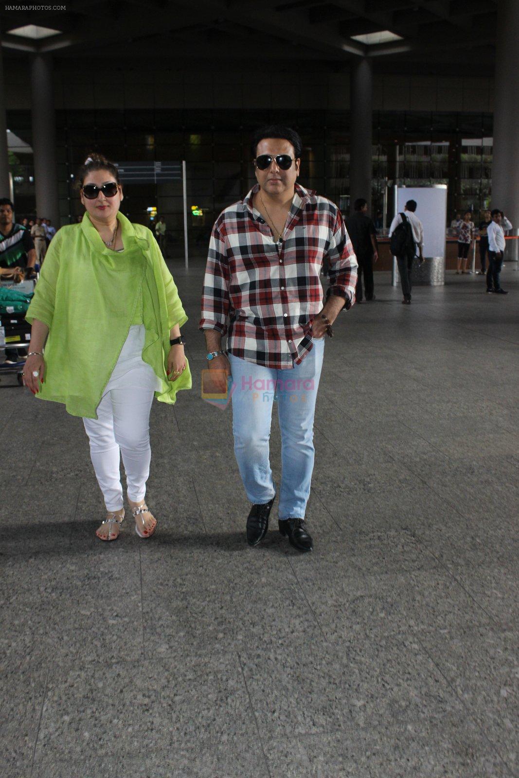 Govinda with wife Sunita Ahuja snapped at Airport on 13th June 2016