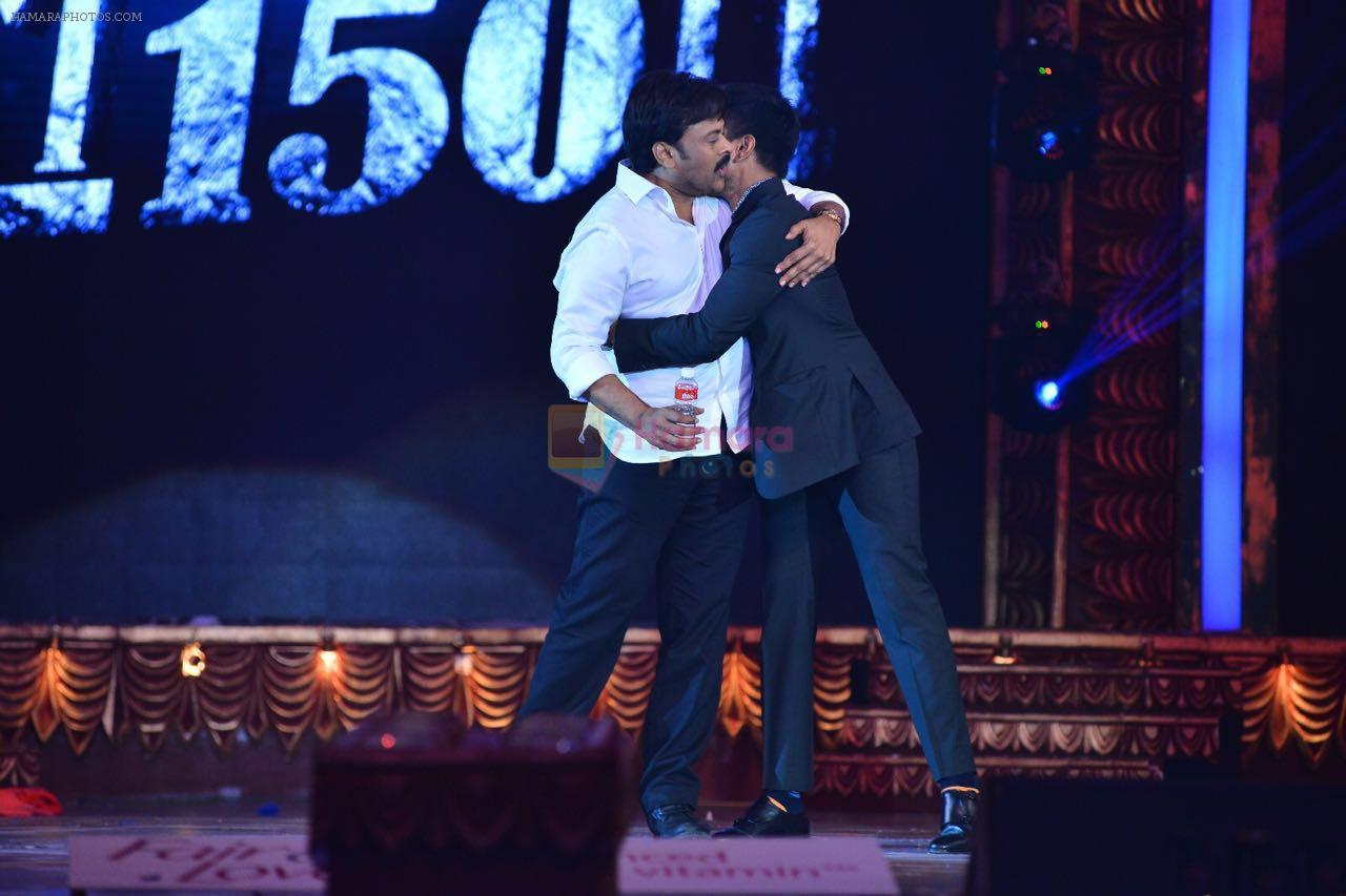 Chiranjeevi with son Ram Charan on stage at the Maa awards in HICC Hyderabad on 12th June 2016
