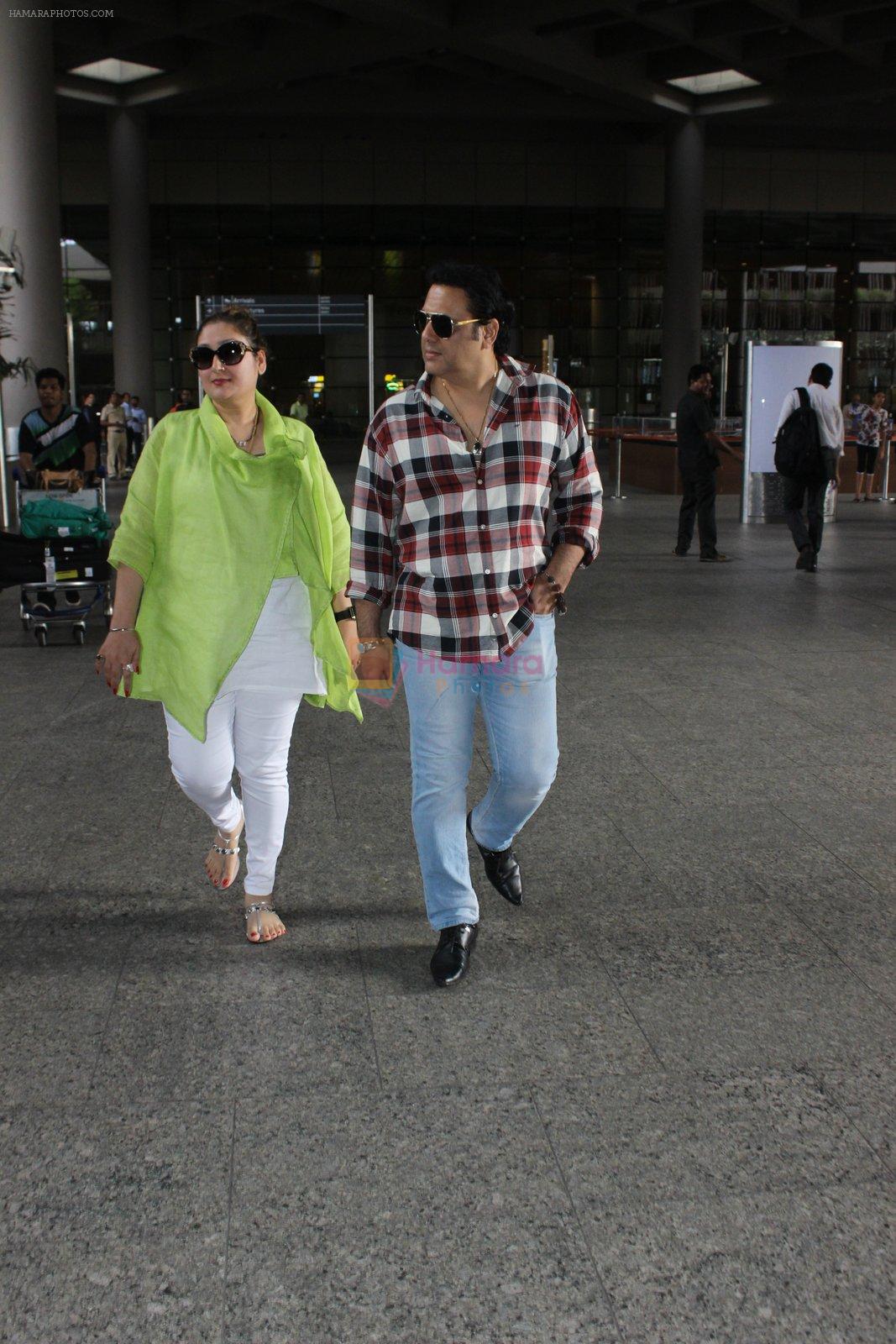 Govinda with wife Sunita Ahuja snapped at Airport on 13th June 2016