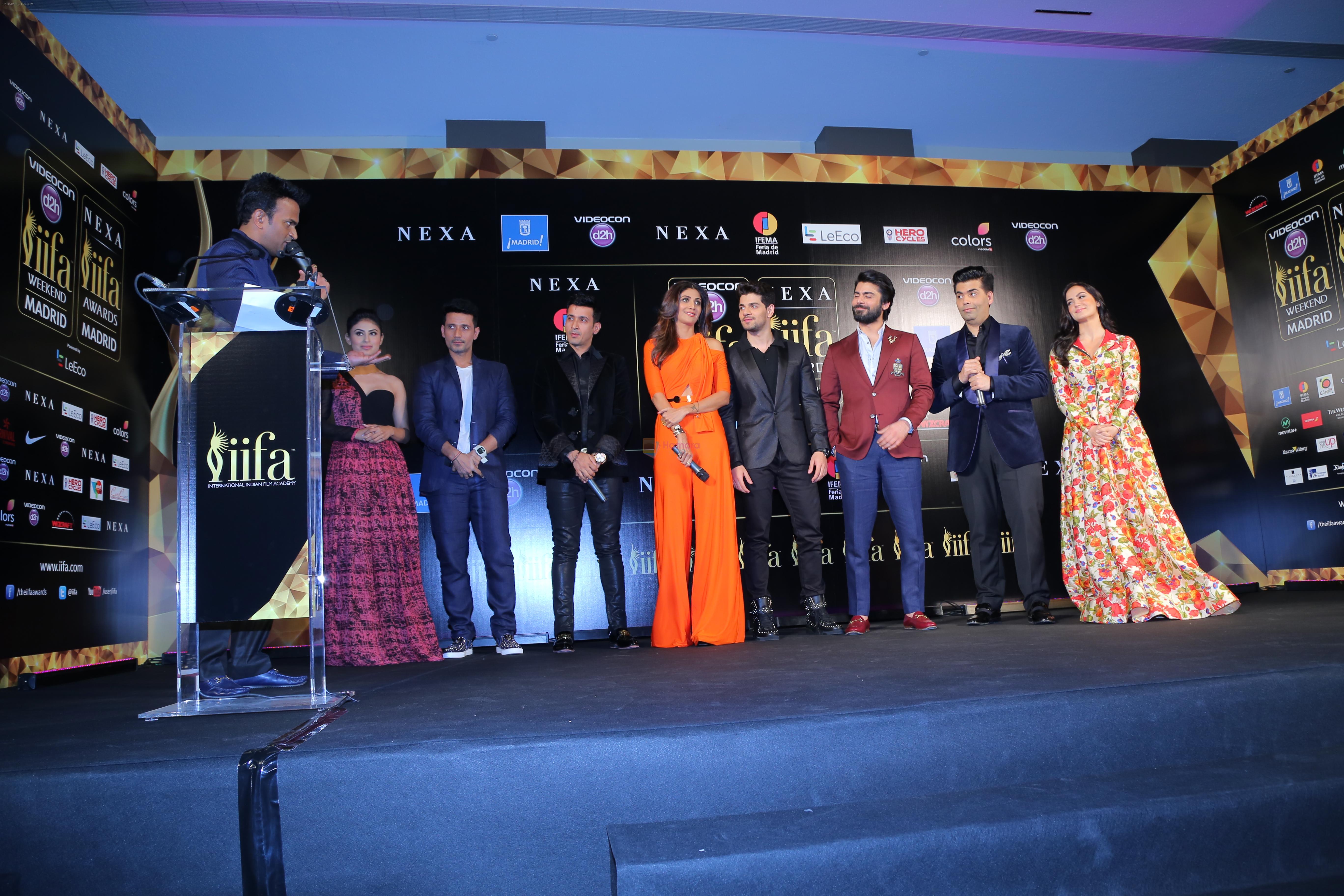 (L-R) Siddharth Kannan, Mouni Roy, Meet Bros, Shilpa Shetty, Sooraj Pancholi, Fawad Khan, Karan Johar and Elli Avram   at the IIFA 2016 Opening Press Conference in Madrid