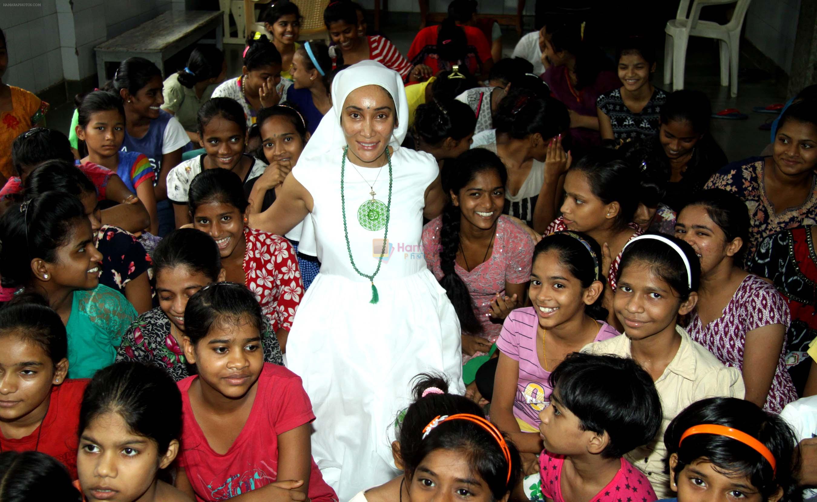 Gaia Mother Sofia distributed note books,bags to 140 girls of Bal Bhawan NGO at Andheri on 4th July 2016