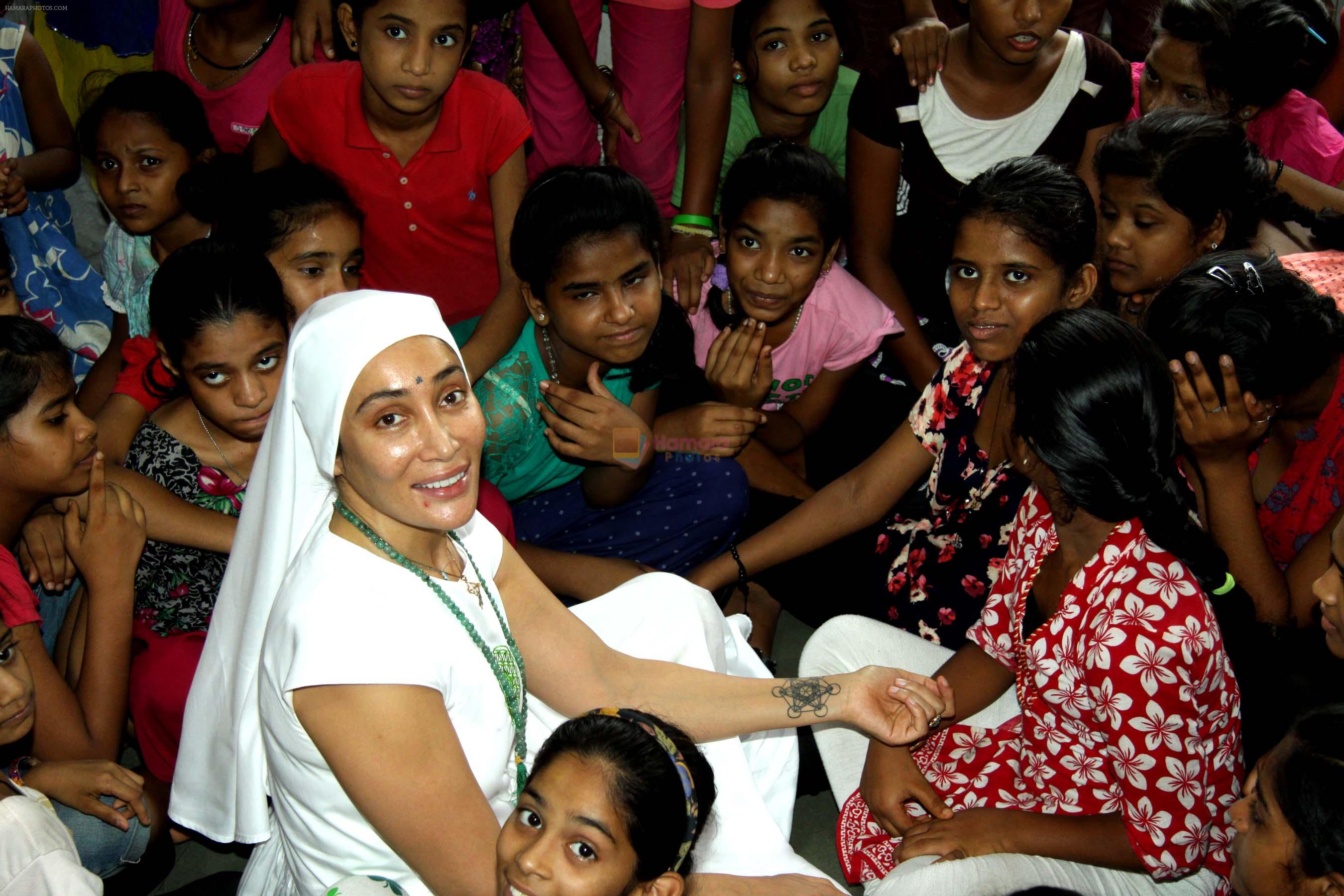 Gaia Mother Sofia distributed note books,bags to 140 girls of Bal Bhawan NGO at Andheri on 4th July 2016