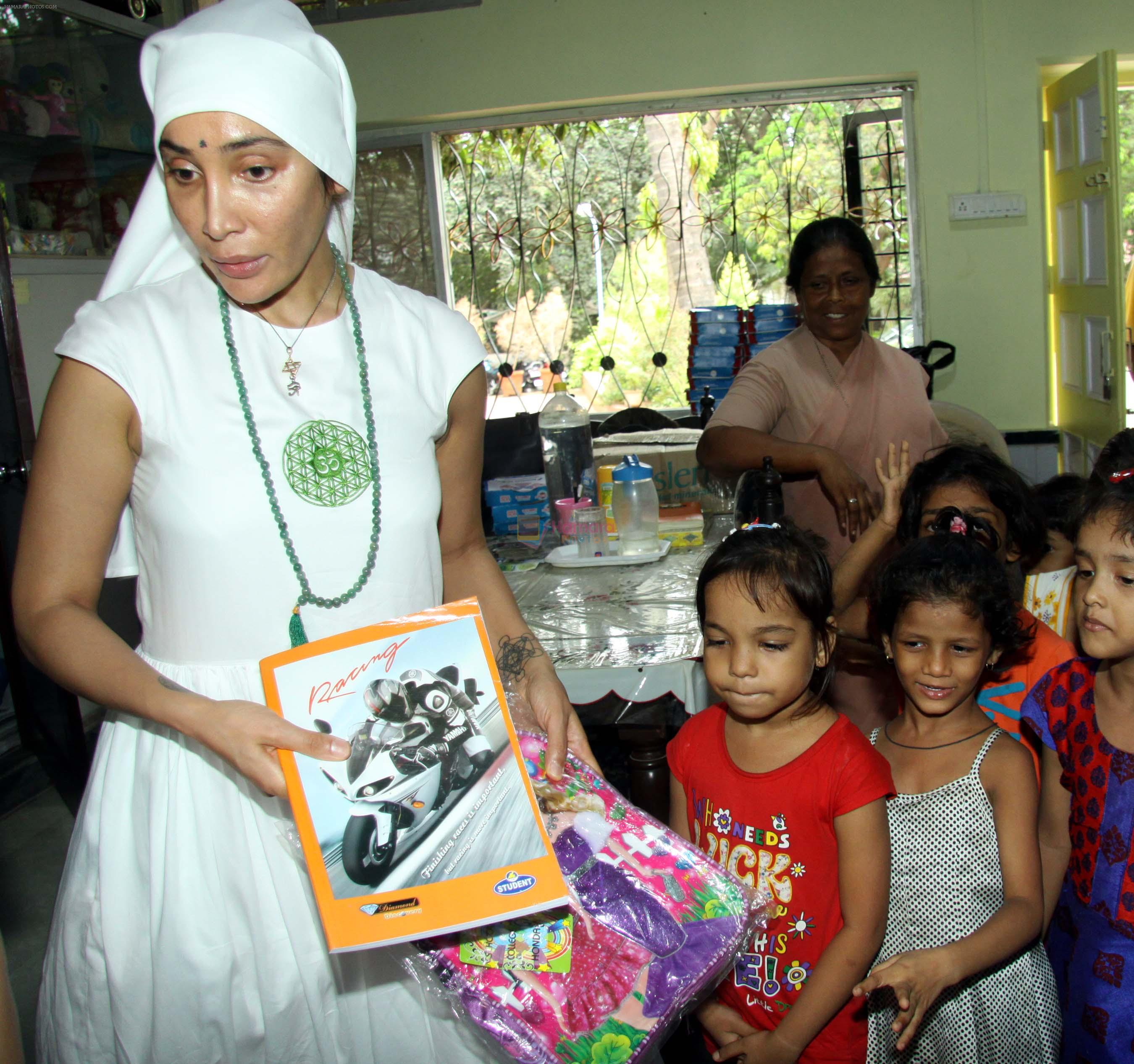 Gaia Mother Sofia distributed note books,bags to 140 girls of Bal Bhawan NGO at Andheri on 4th July 2016