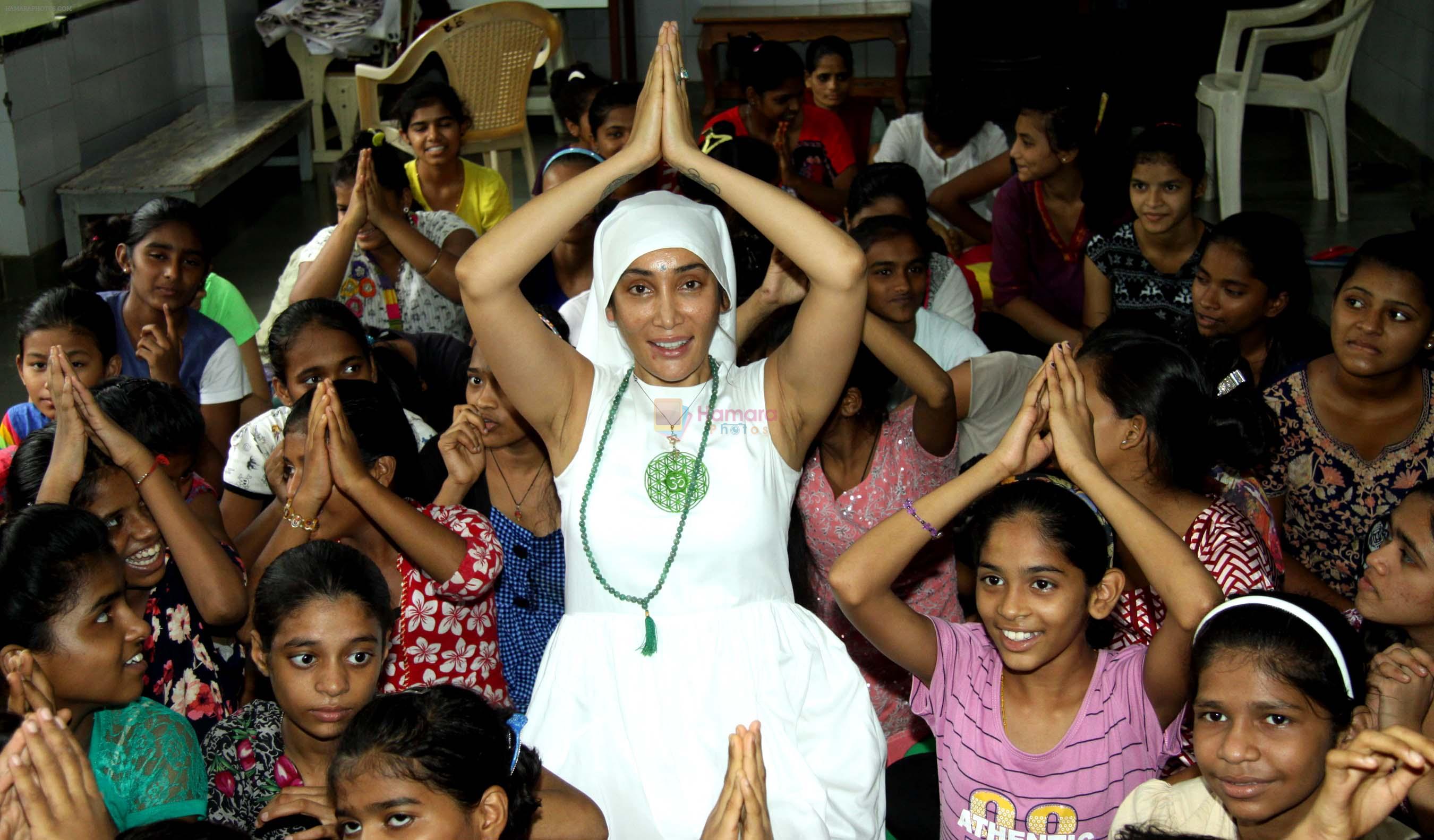 Gaia Mother Sofia distributed note books,bags to 140 girls of Bal Bhawan NGO at Andheri on 4th July 2016