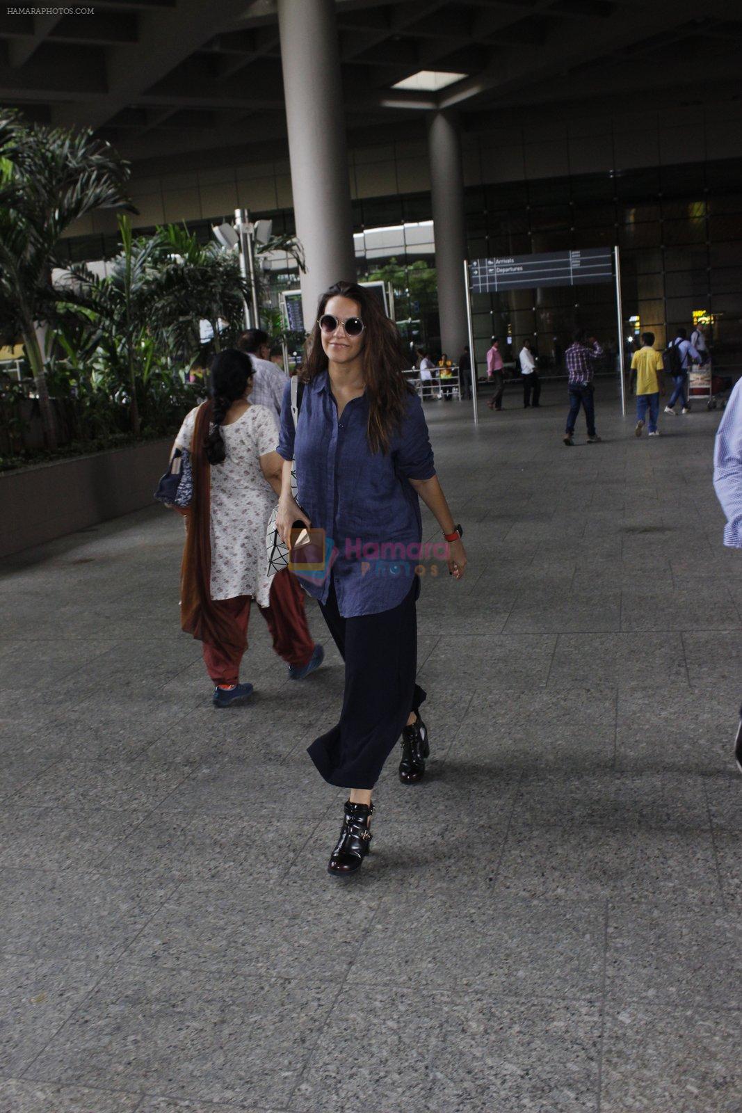Neha Dhupia snapped at airport on 18th July 2016