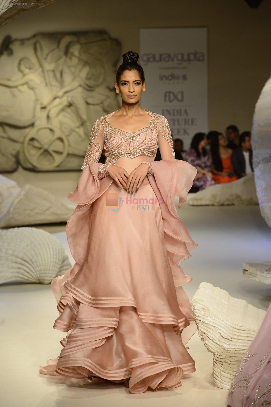 Model walks the ramp during showcase of Gaurav Gupta collection scape song at FDCI India Couture Week 2016 on 23 July 2016