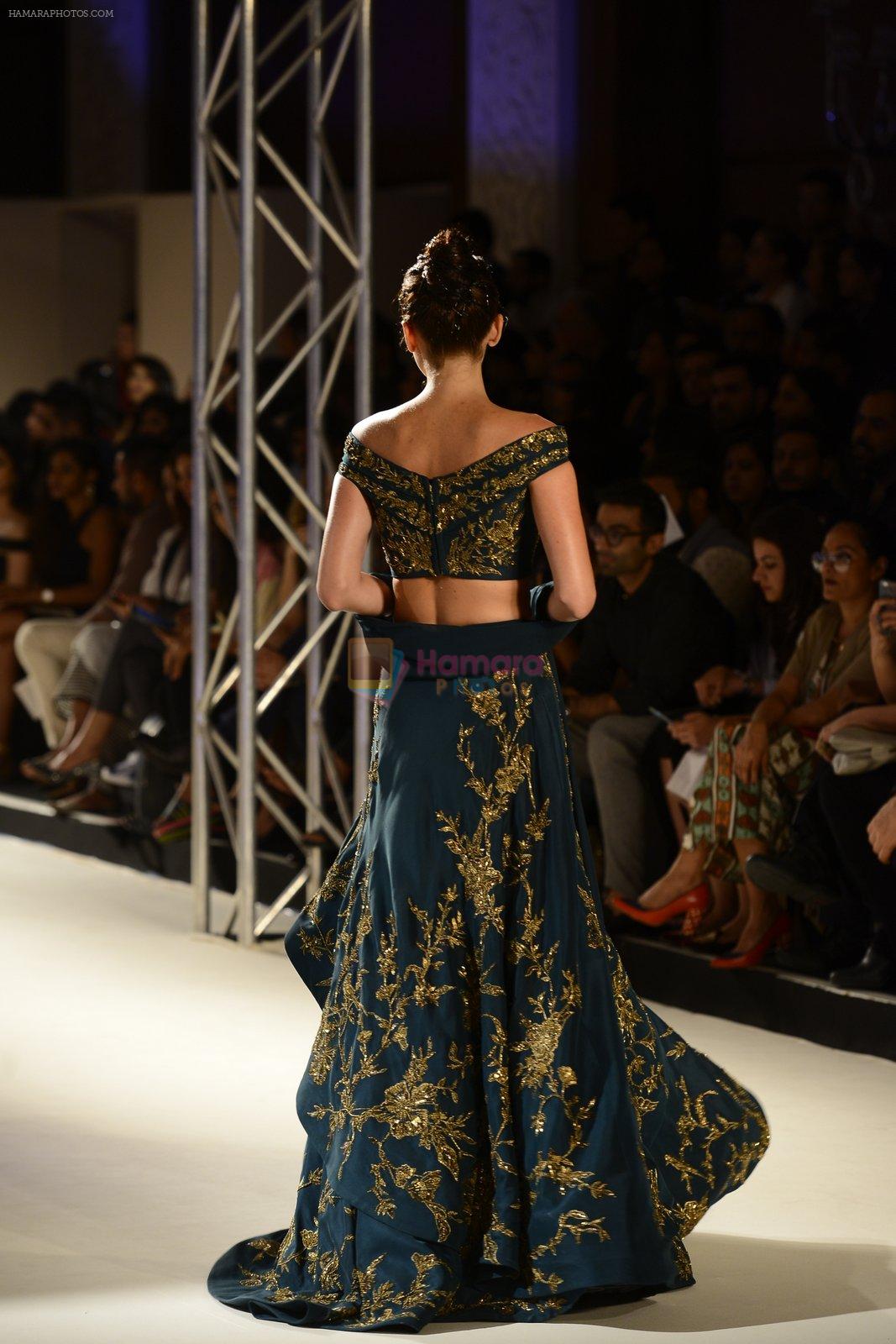 Model walks the ramp during showcase of Gaurav Gupta collection scape song at FDCI India Couture Week 2016 on 23 July 2016