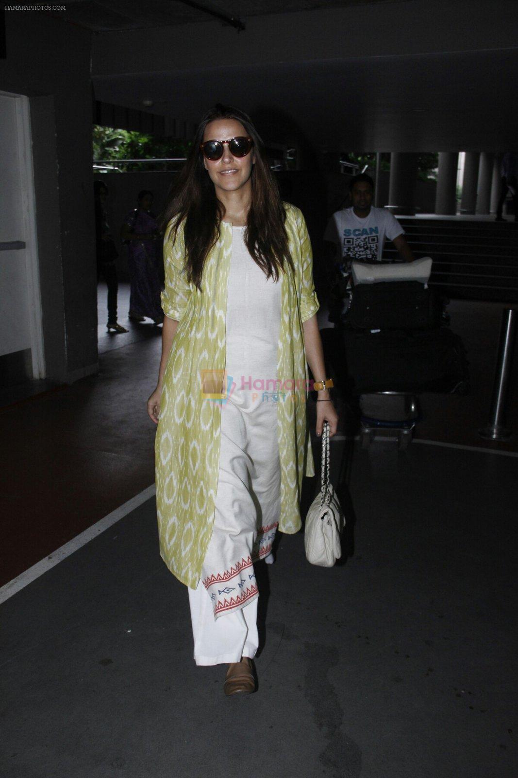 Neha Dhupia snapped at airport on 30th Aug 2016