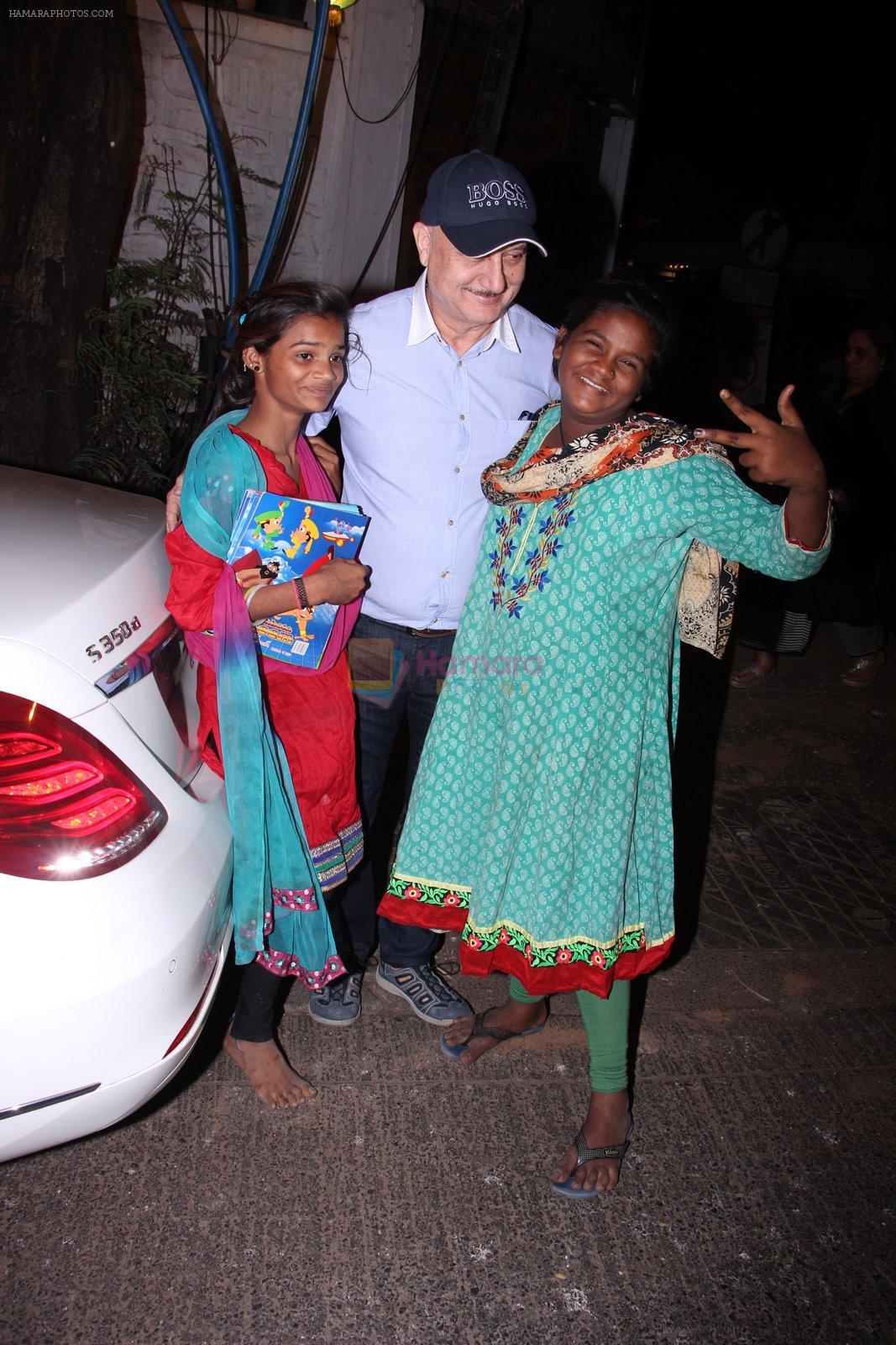 Anupam Kher snapepd with street kids on 30th Dec 2016