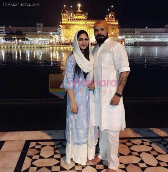 Bunty Walia snapped at golden temple blessed by a baby boy