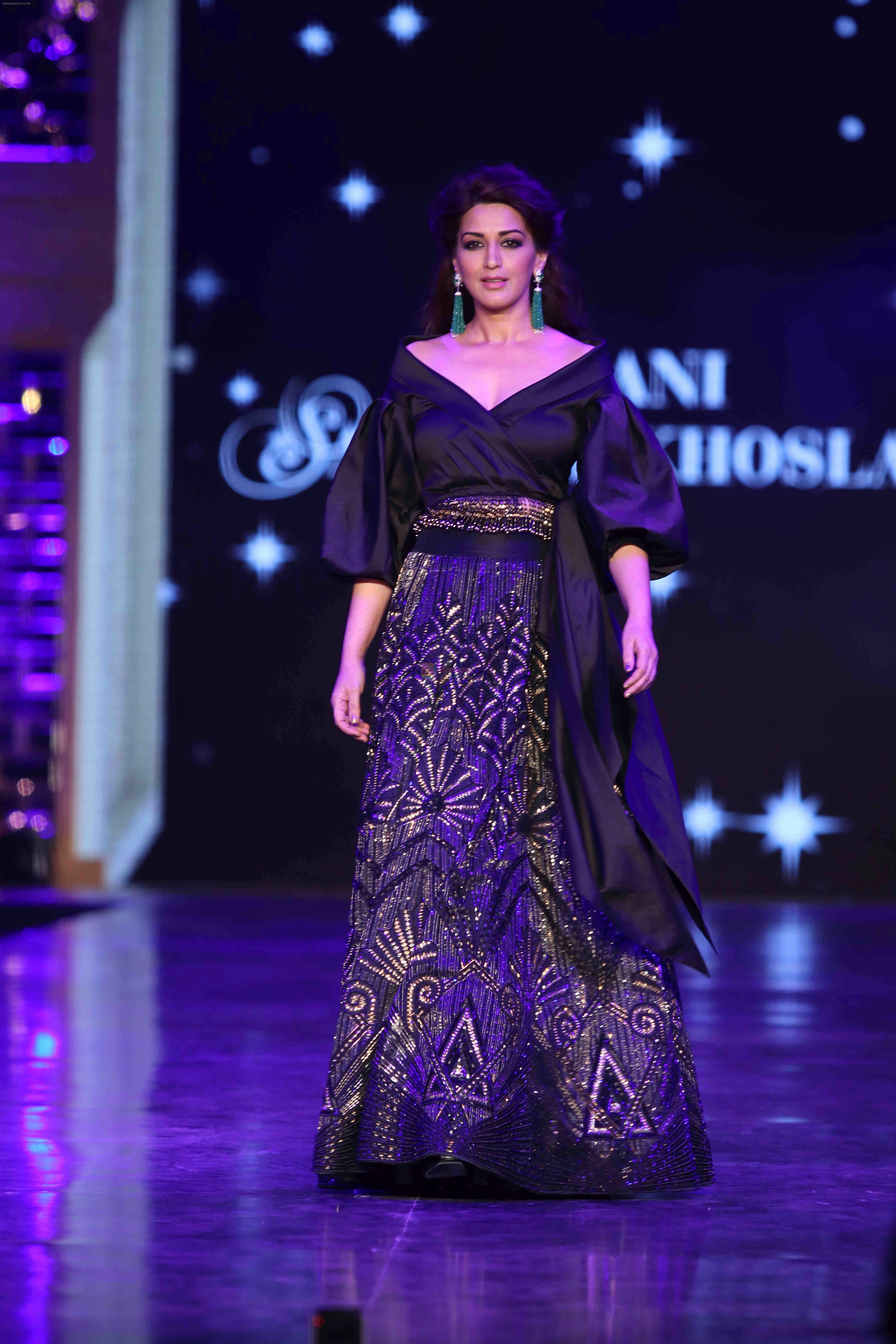 Sonali Bendre walk the ramp at 12th Annual Caring with Style fashion show