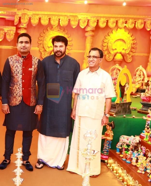 Rajesh Kalyanaraman Executive Director Kalyan Jewellers, Actor Mammootty  and T.S. Kalyanaraman Chairman Kalyan Jewellers at the Navratri party of the Kalyan Jewellers family