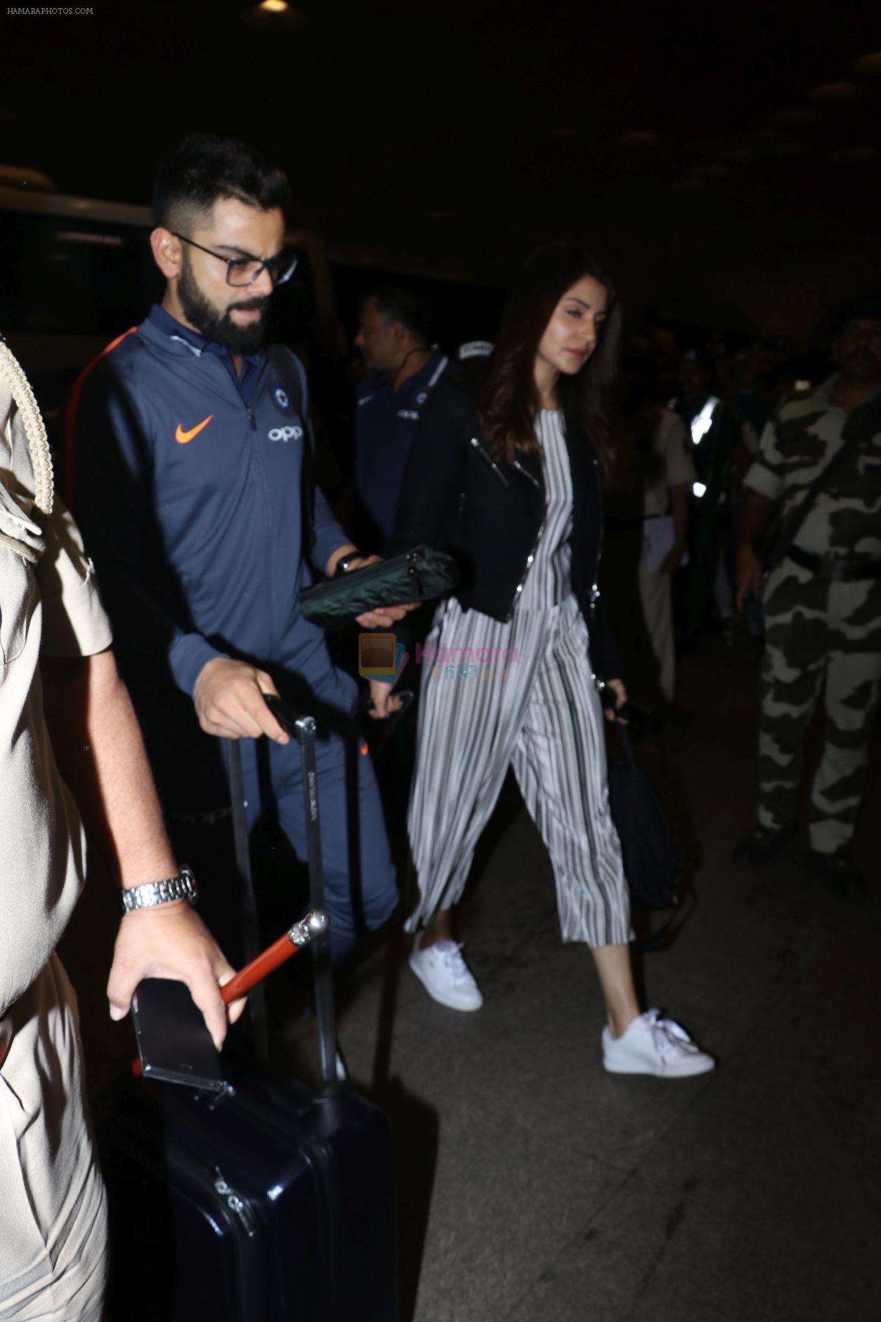 Anushka Sharma, Virat Kohli spotted at Airport on 27th Dec 2017