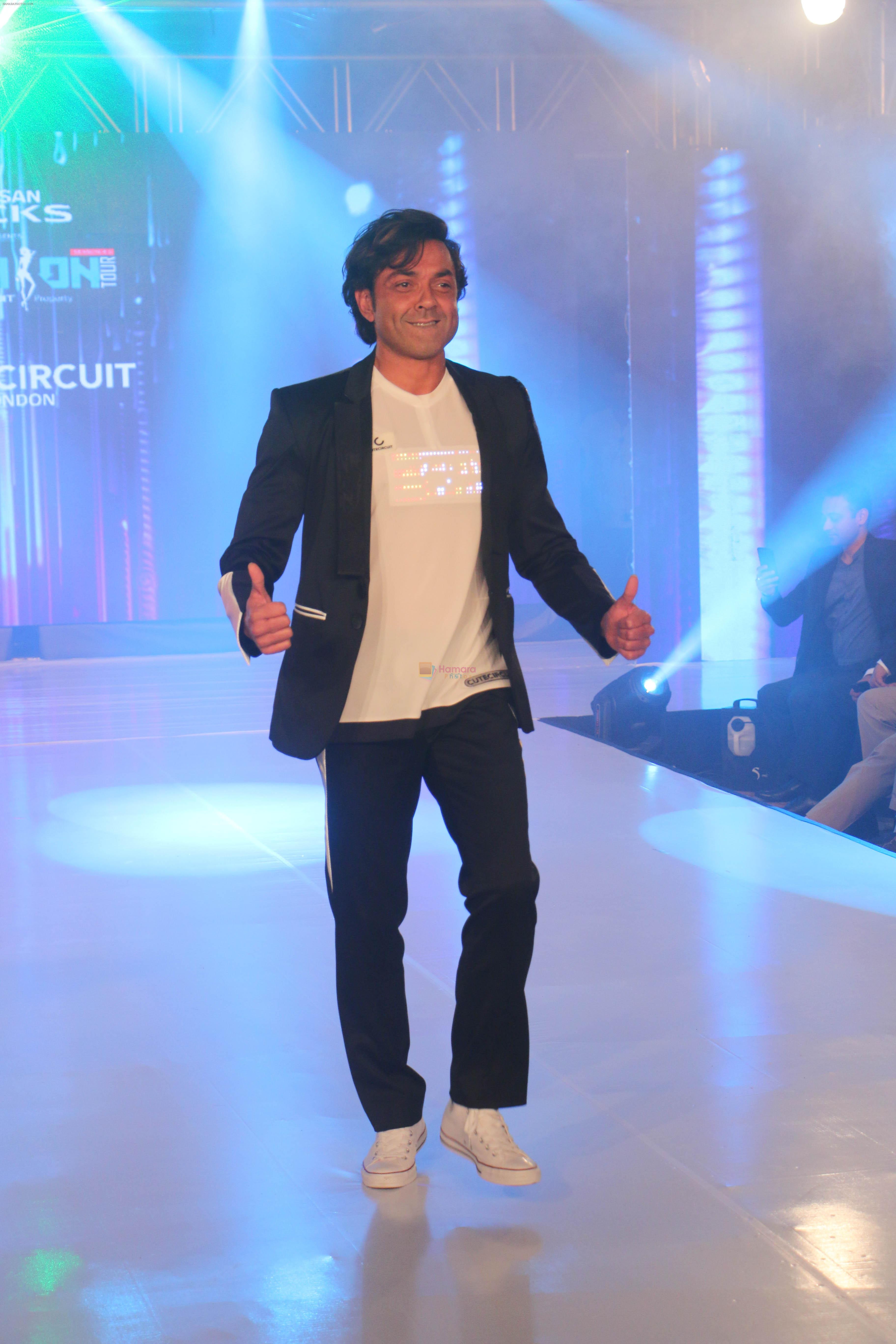 Bobby Deol walk the ramp during the Exhibit Tech Fashion tour in jw marriott juhu on 18th Oct 2018
