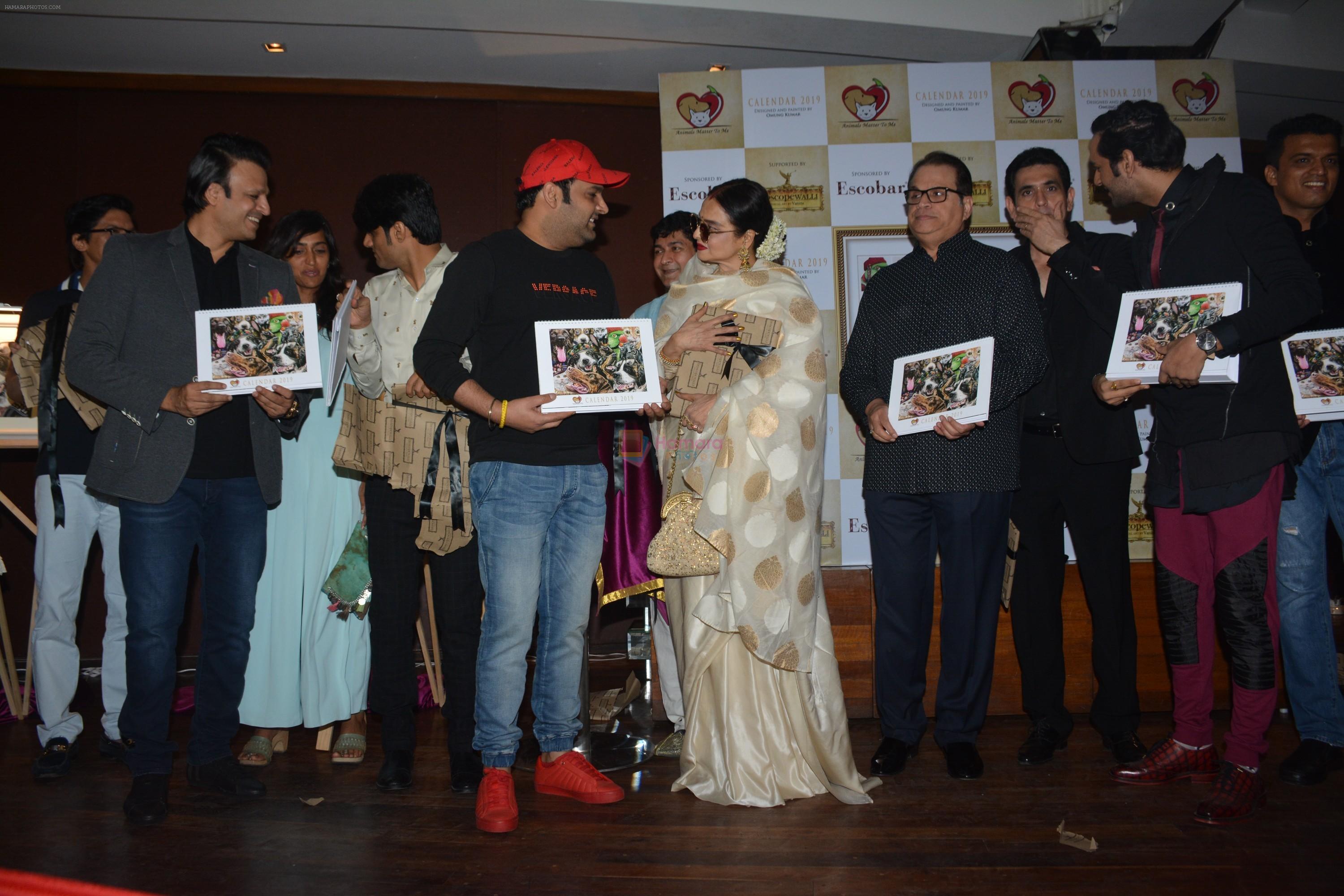 Rekha, Kapil Sharma , Vivek Oberoi, Shaan, Shiamak Dawar, Ramesh Taurani at the launch of Hand Painted Animal Calendar By Filmmaker Omung Kumar on 21st Nov 2018