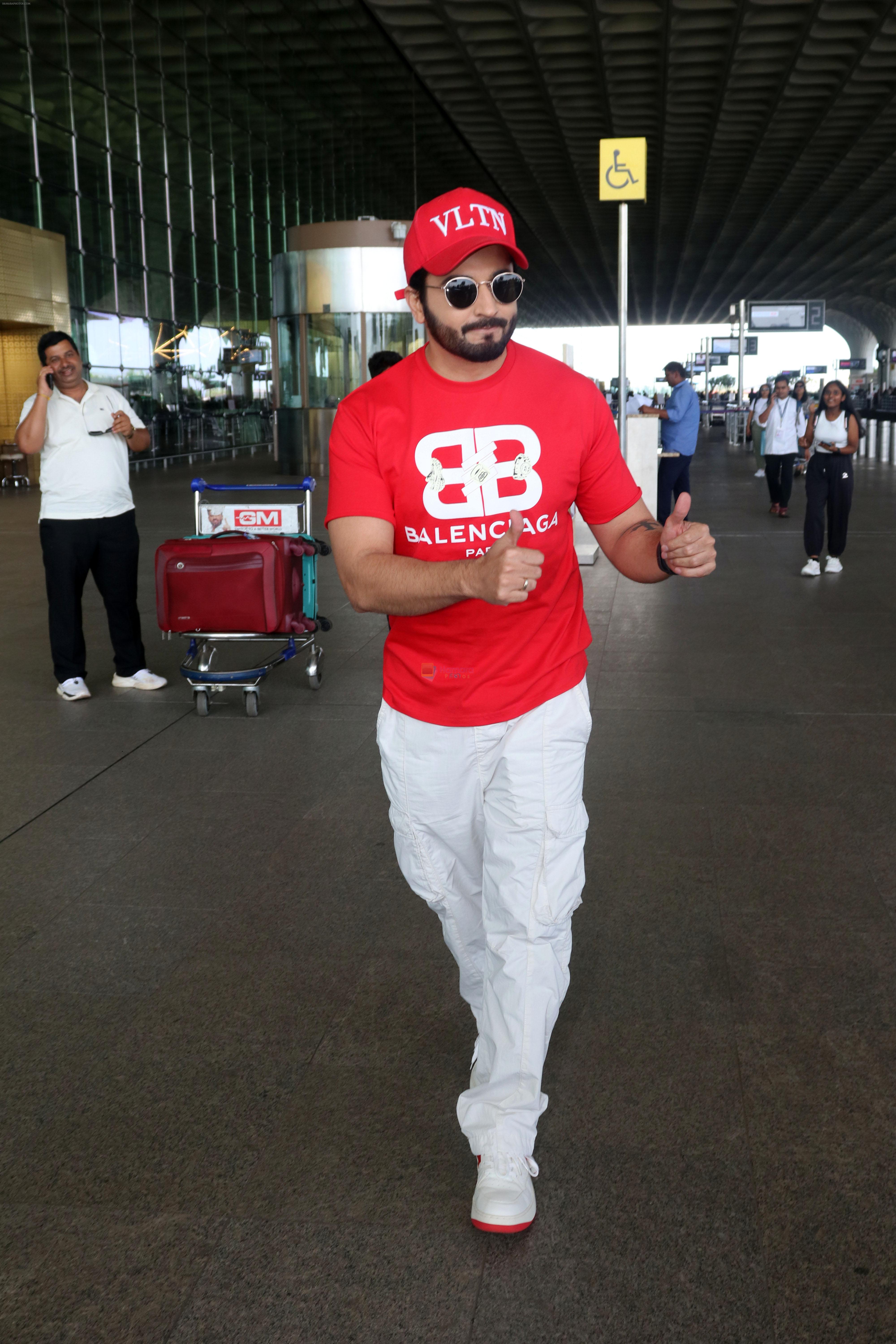 Dheeraj Dhoopar wearing VLTN Cap Balenciaga Paris T-Shirt White Pants and Shoes with red sole on 24 May 2023