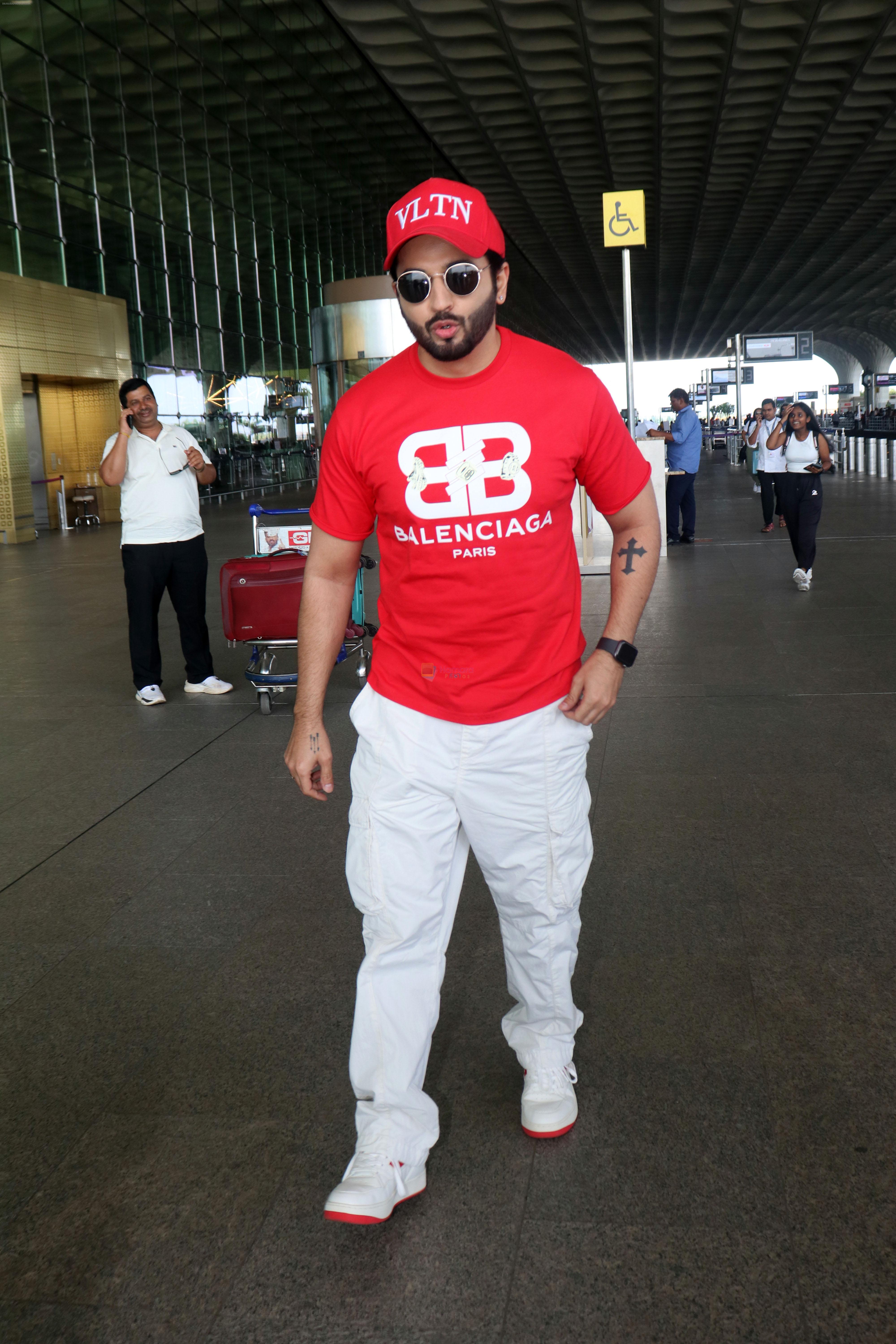 Dheeraj Dhoopar wearing VLTN Cap Balenciaga Paris T-Shirt White Pants and Shoes with red sole on 24 May 2023