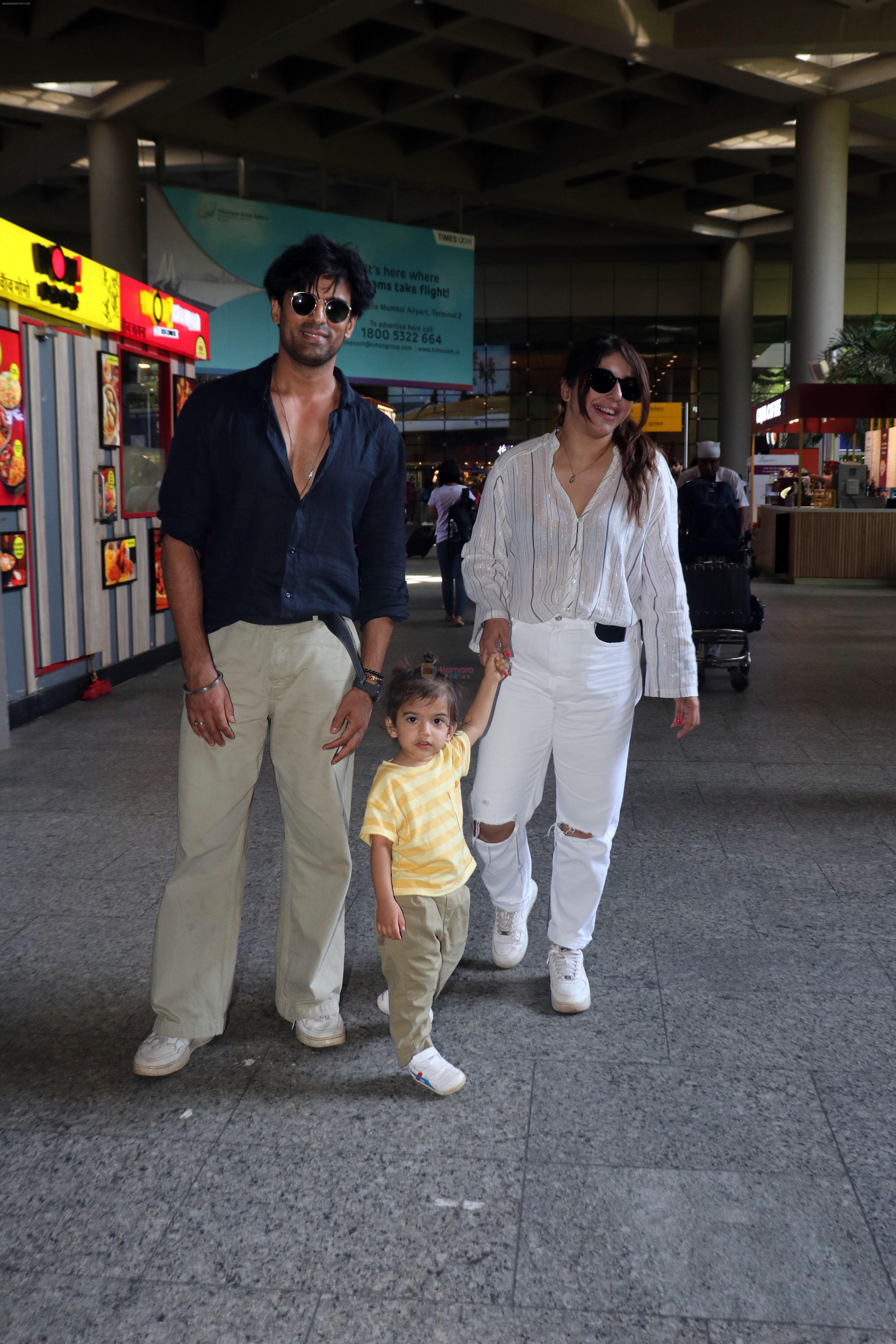 Addite Malik, Mohit Malik along with their child at the aiport on 20th May 2023