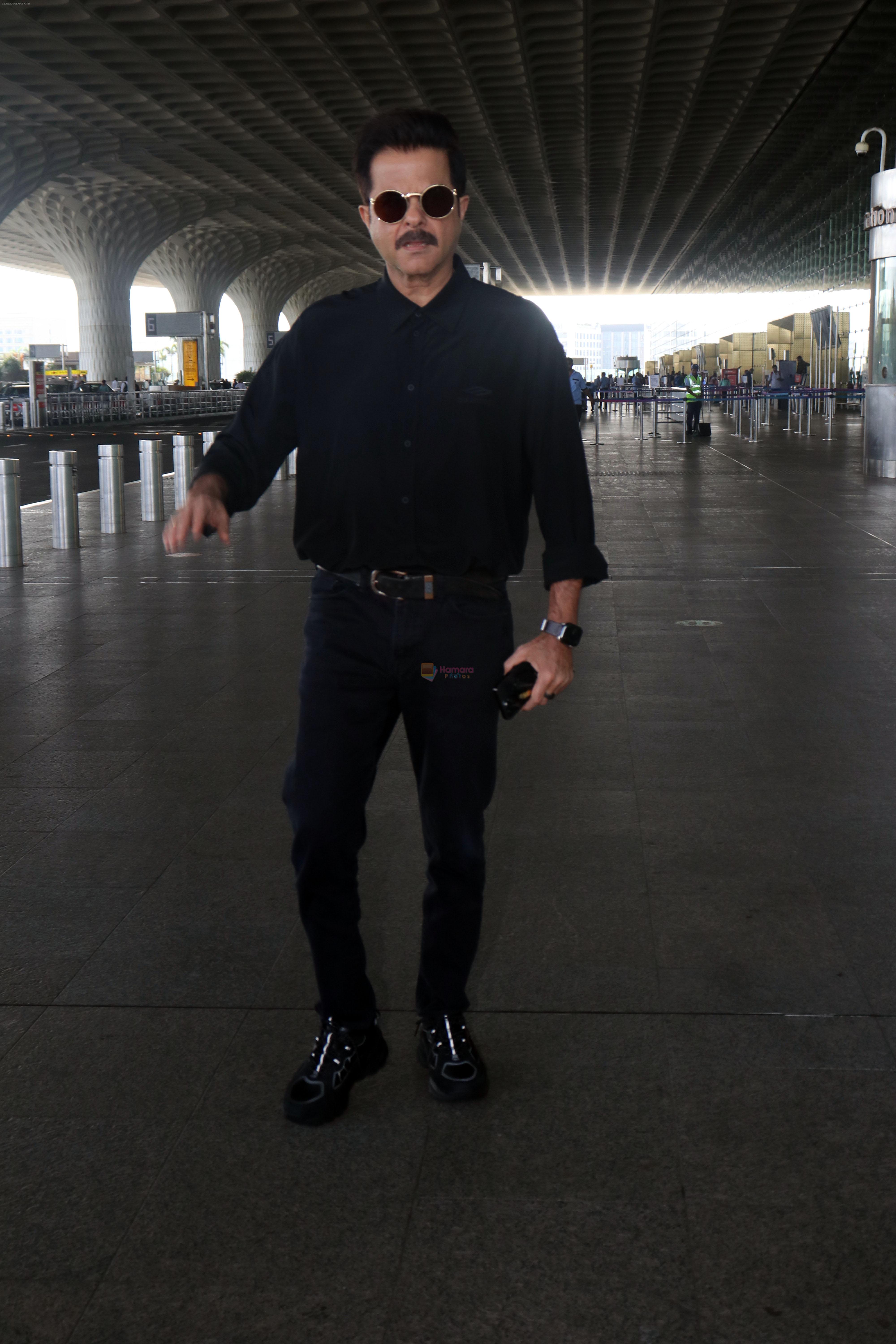 Anil Kapoor dressed in black with shades at the airport on 19th May 2023