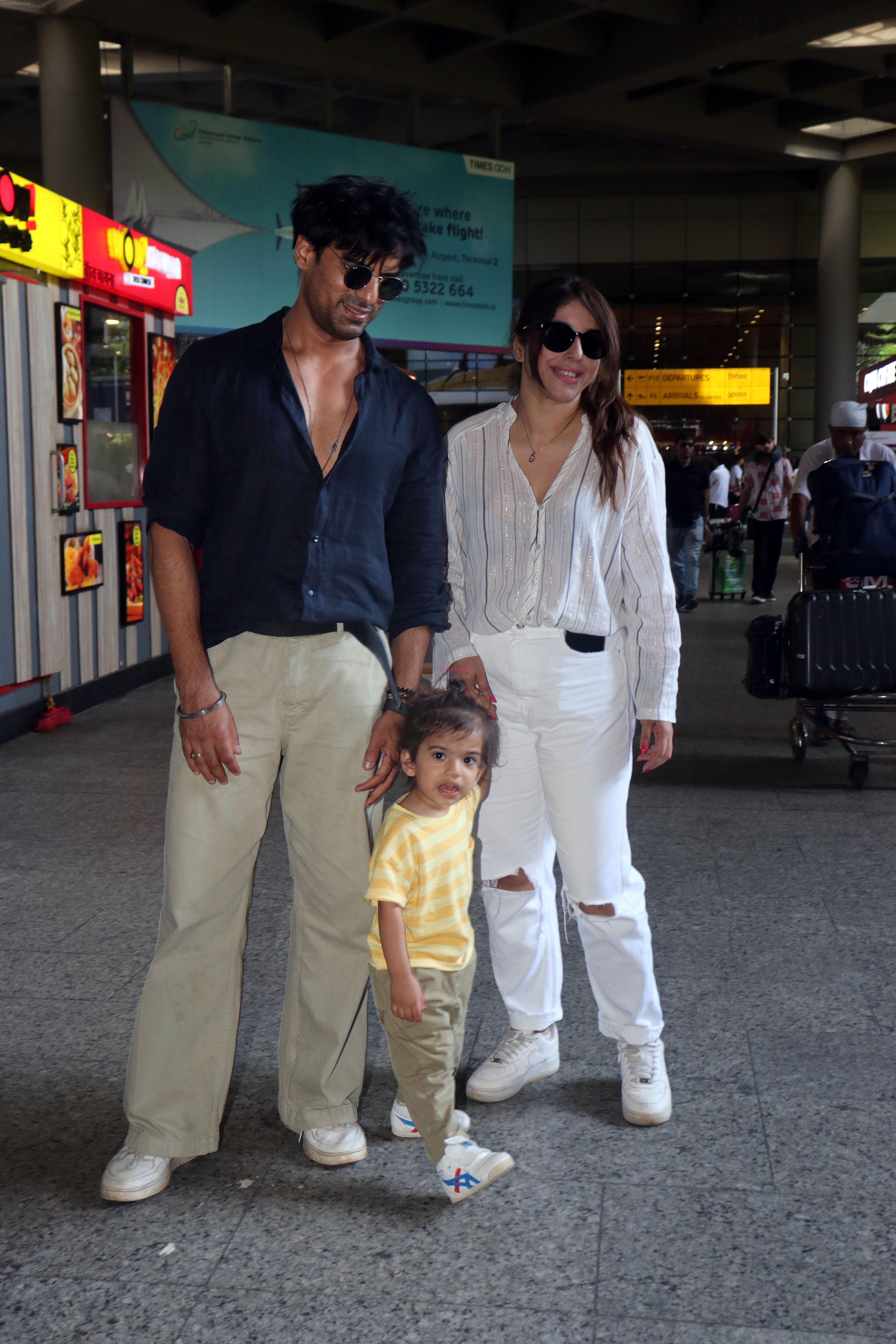 Addite Malik, Mohit Malik along with their child at the aiport on 20th May 2023