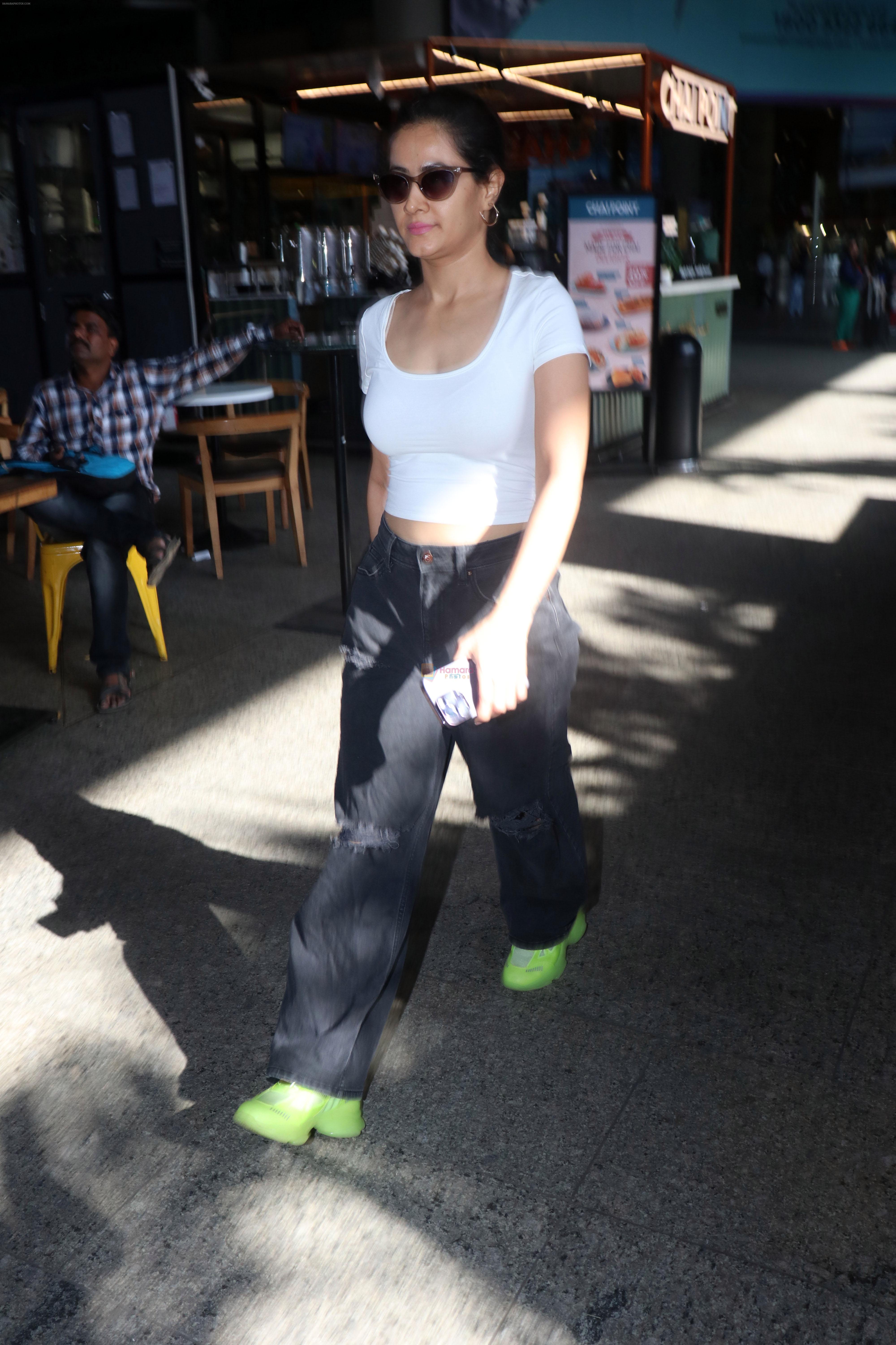 Sonia Balani dressed in a white top black jeans and green shoes on 23rd May 2023