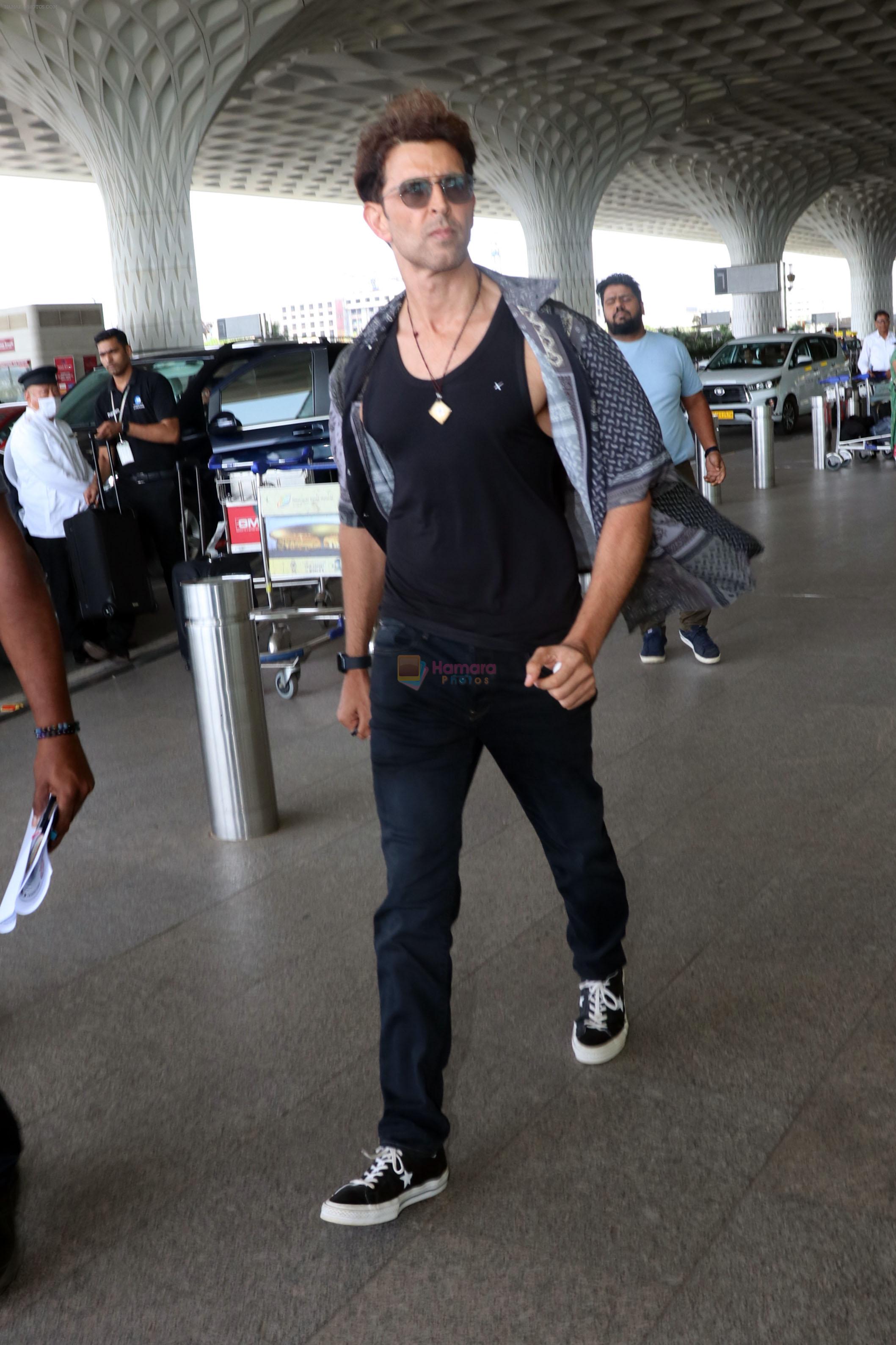 Hrithik Roshan in black teas unbuttoned shirt dark blue jeans and Converse  Cons One Star Pro OX Shoes / Hrithik Roshan - Bollywood Photos