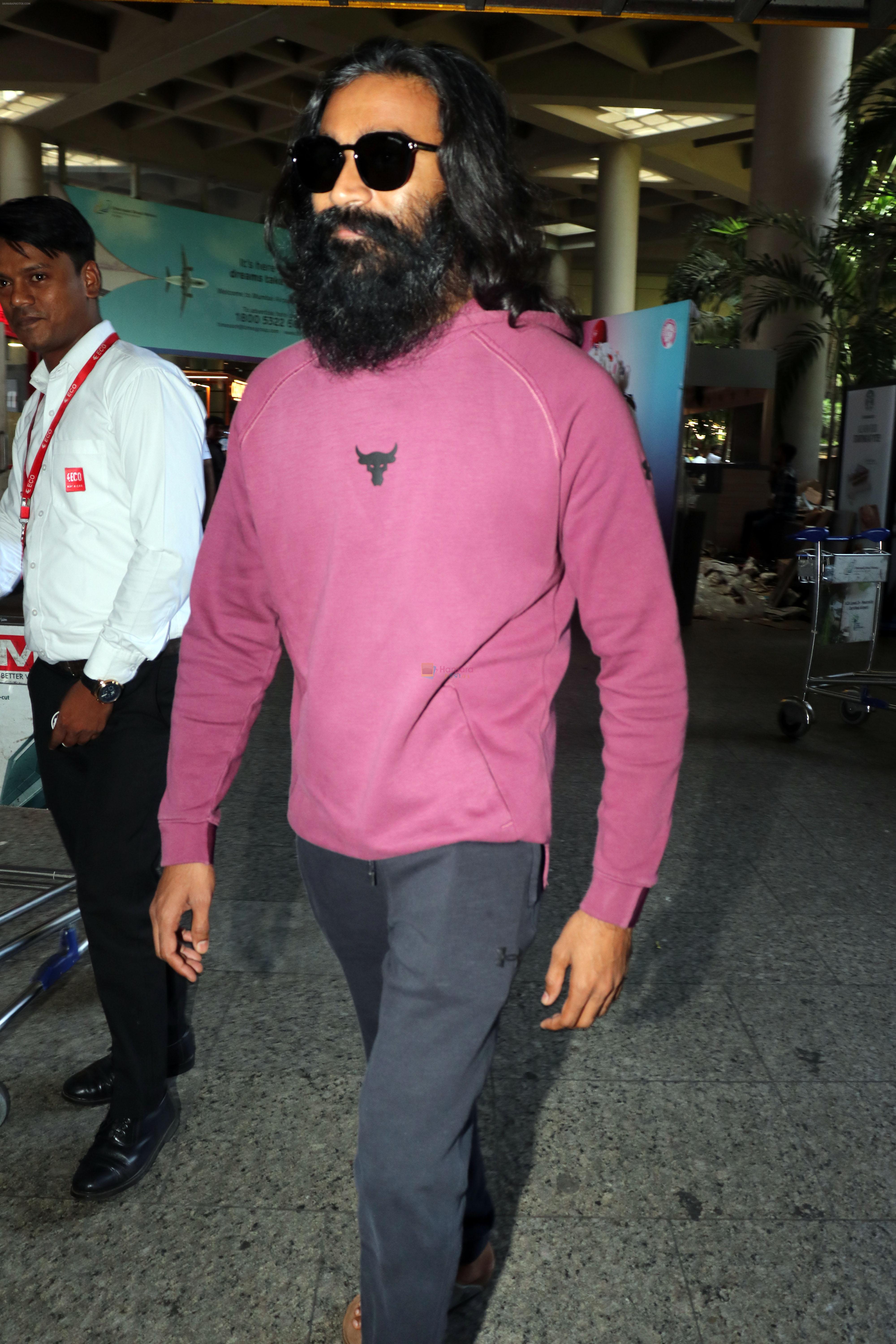 Dhanush wearing pink hoodie and sweat pant