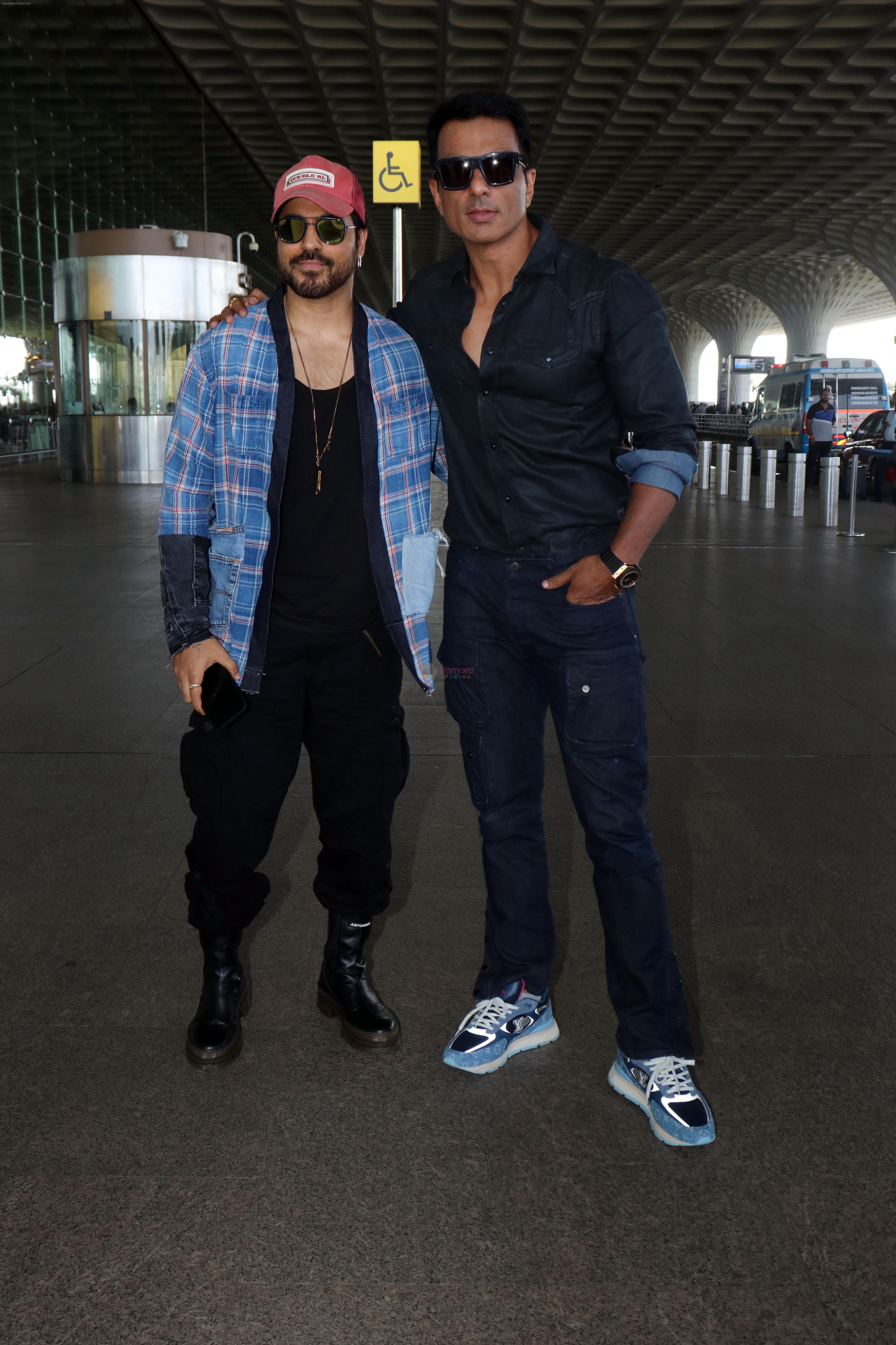 Sonu Sood with Gautam Gulati wearing all jeans, dark glasses and sneakers