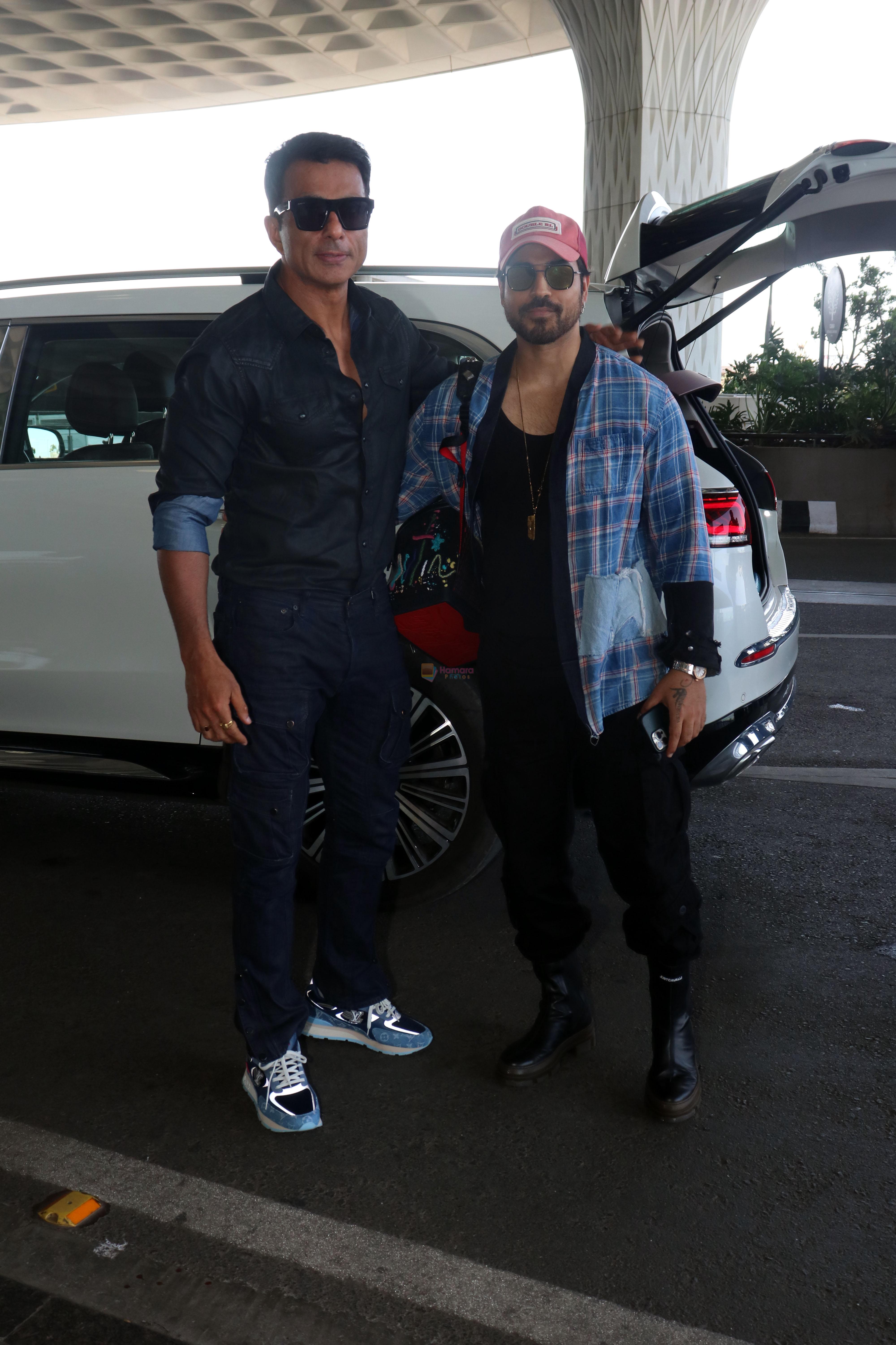 Sonu Sood with Gautam Gulati wearing all jeans, dark glasses and sneakers