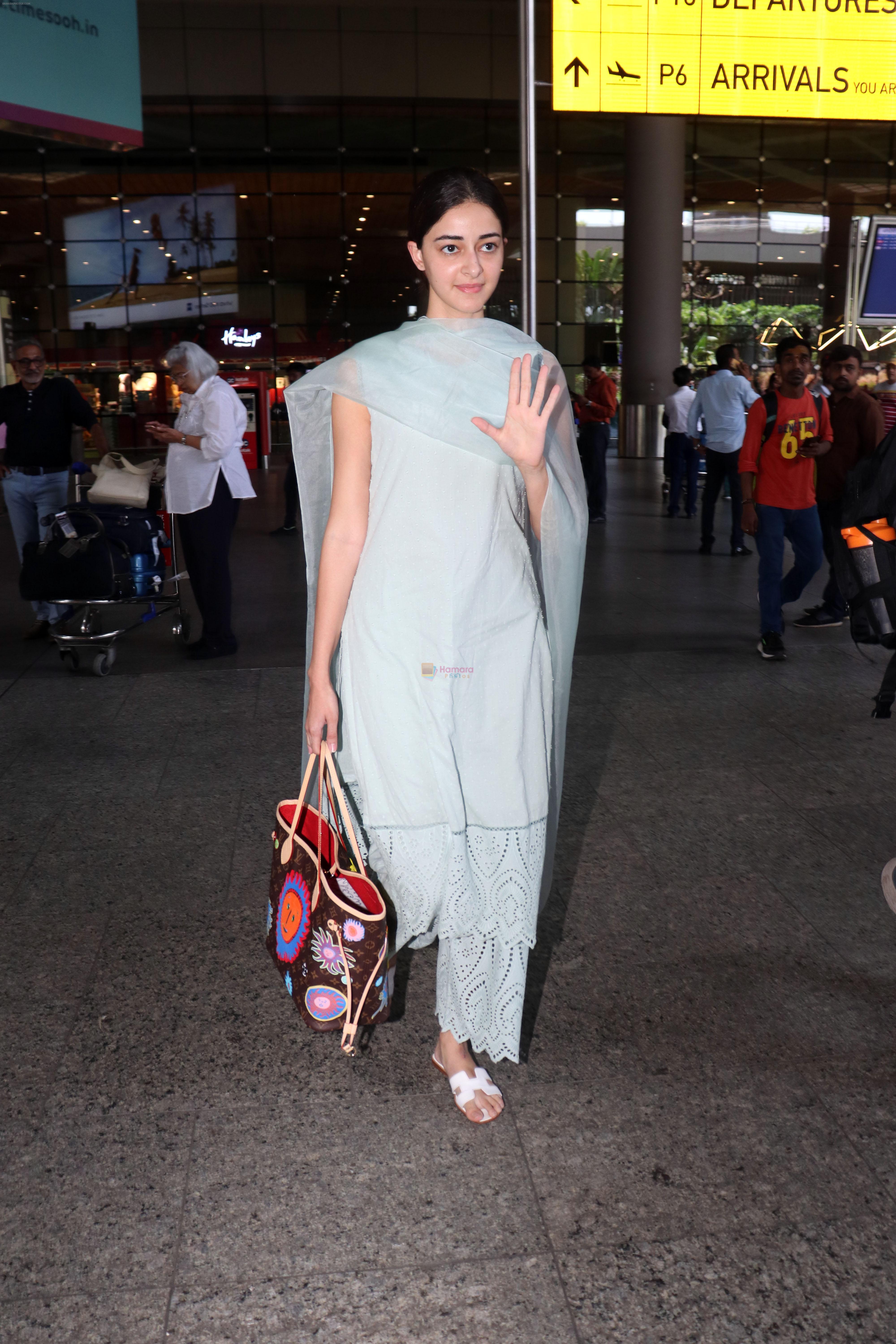 Masked Ananya Panday returns from Dubai decked in limited edition Louis  Vuitton worth over Rs 4 lakh, Rs 3k Playboy joggers. SEE PICS