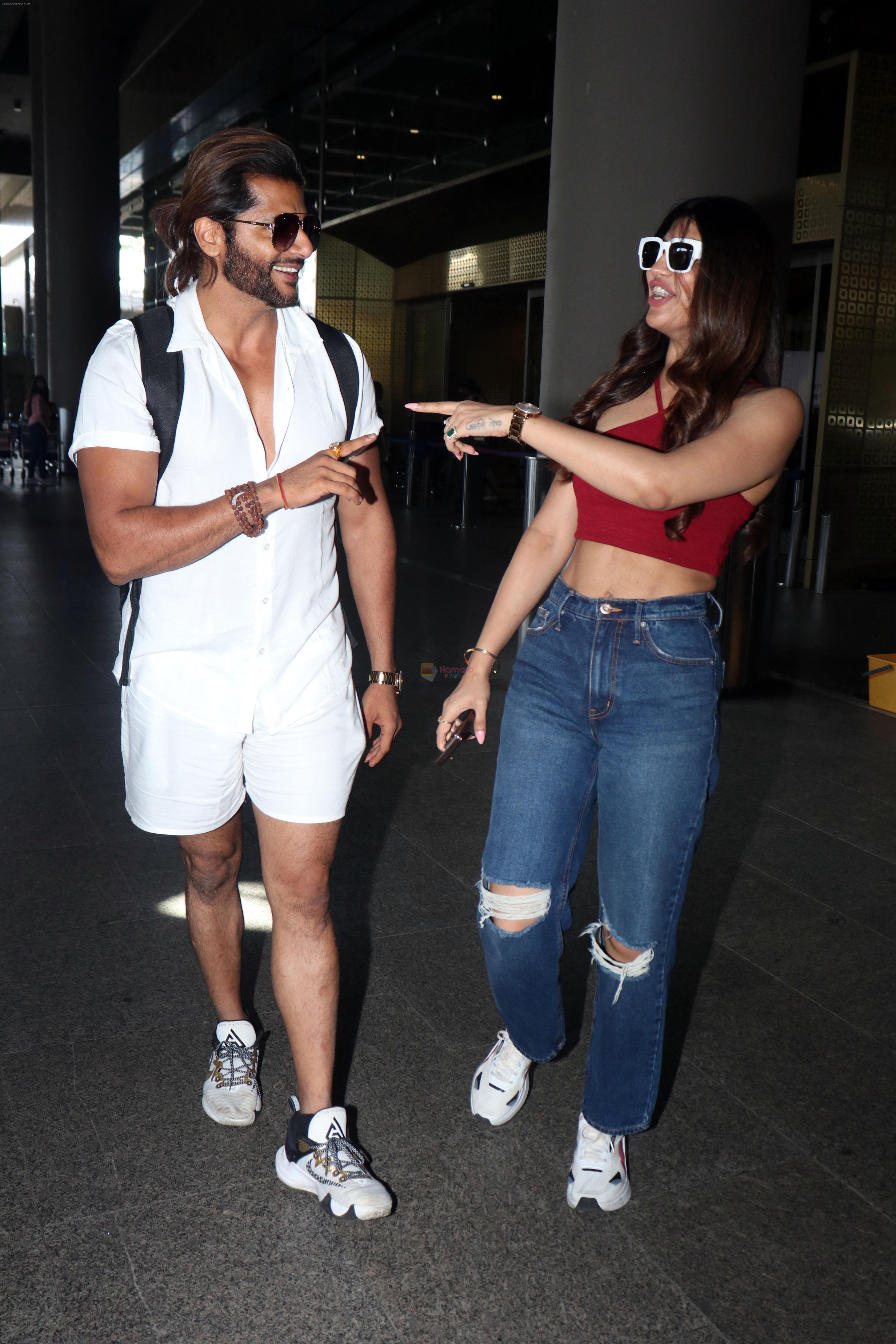 Akanksha Puri in Ravishing Maroon and Karanvir Bohra in Effortless Whites