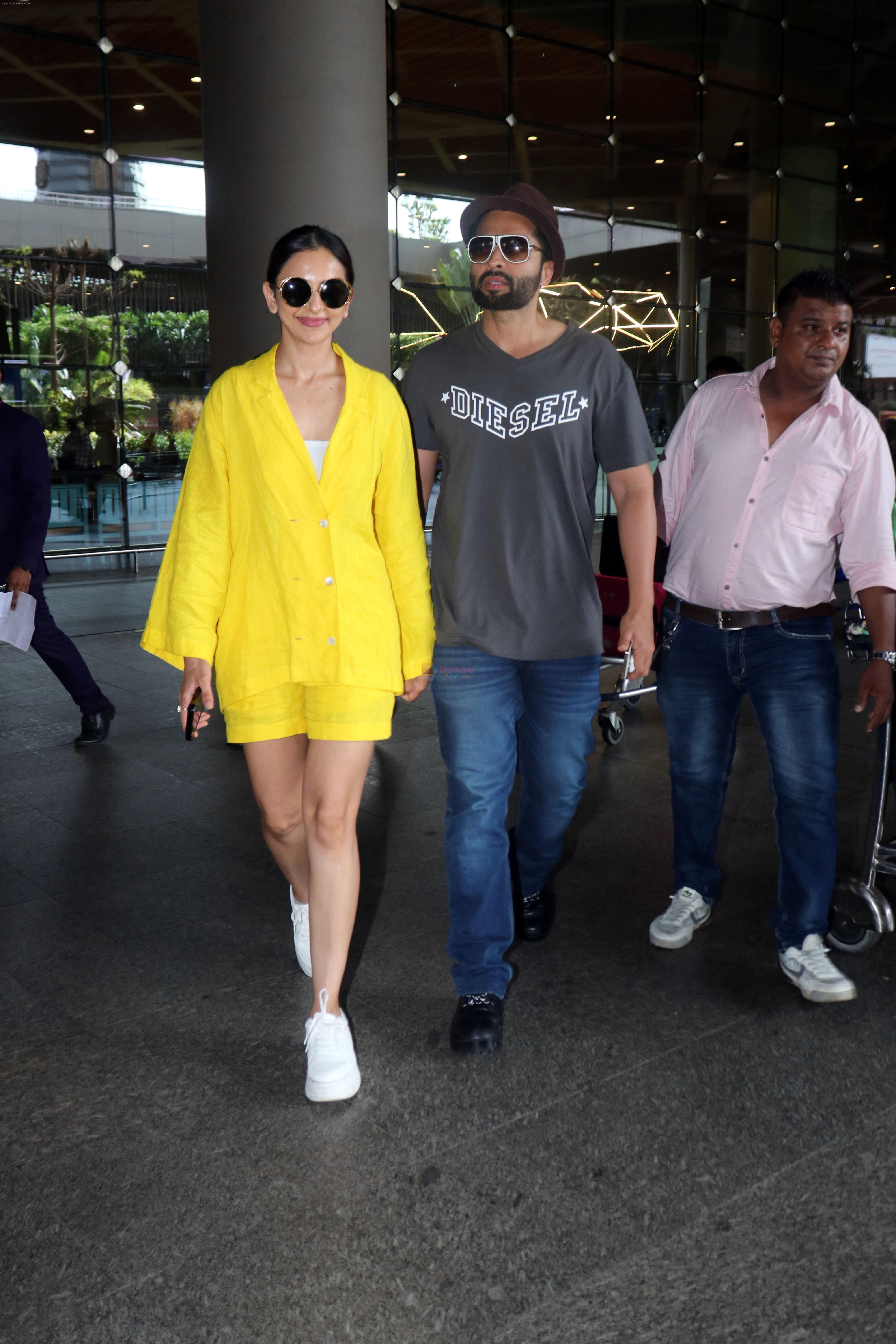 Rakul Preet Singh dressed in yellow Kiara Jacket and Jackky Bhagnani in a slate Diesel Tshirt