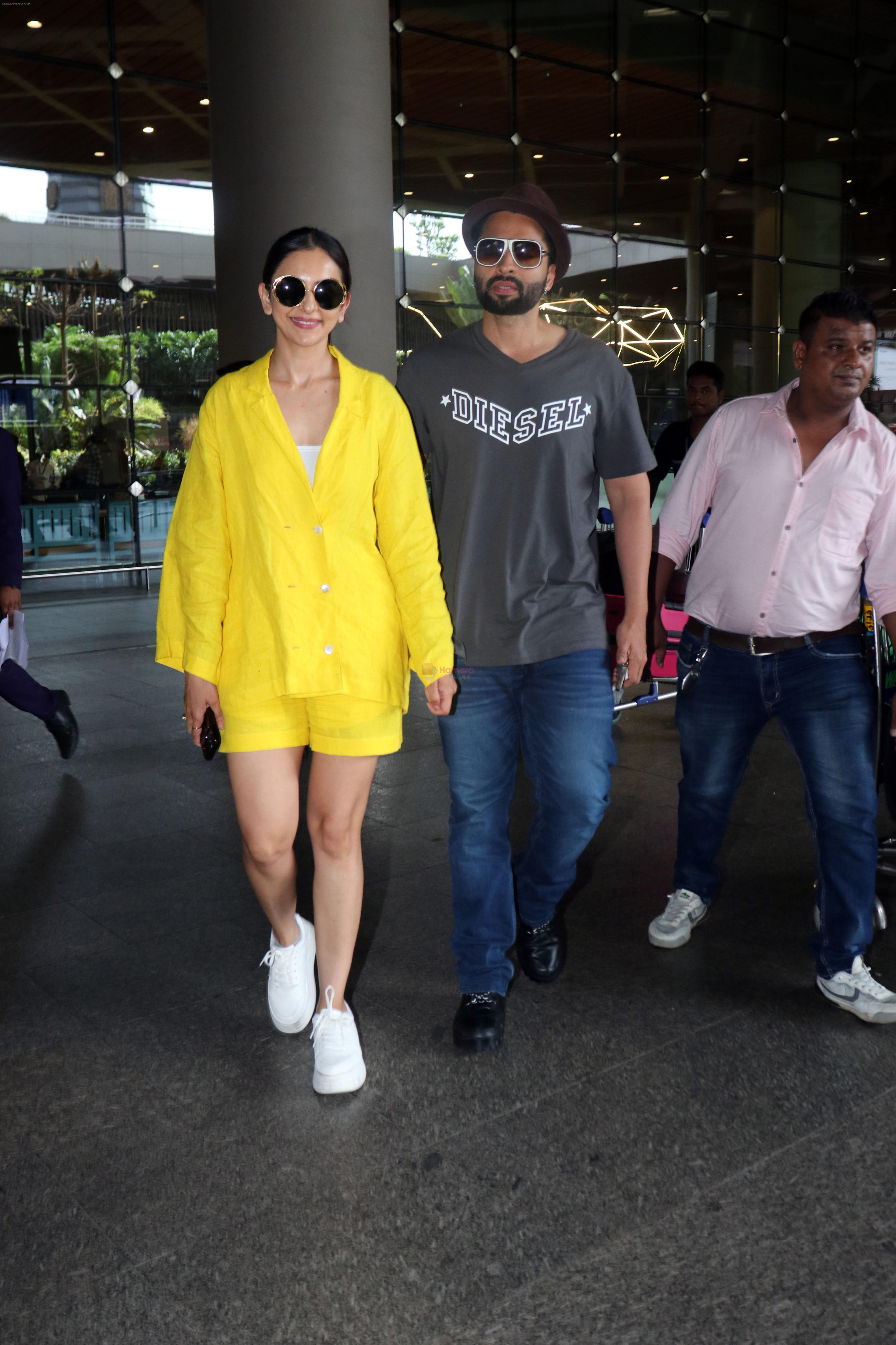 Rakul Preet Singh dressed in yellow Kiara Jacket and Jackky Bhagnani in a slate Diesel Tshirt