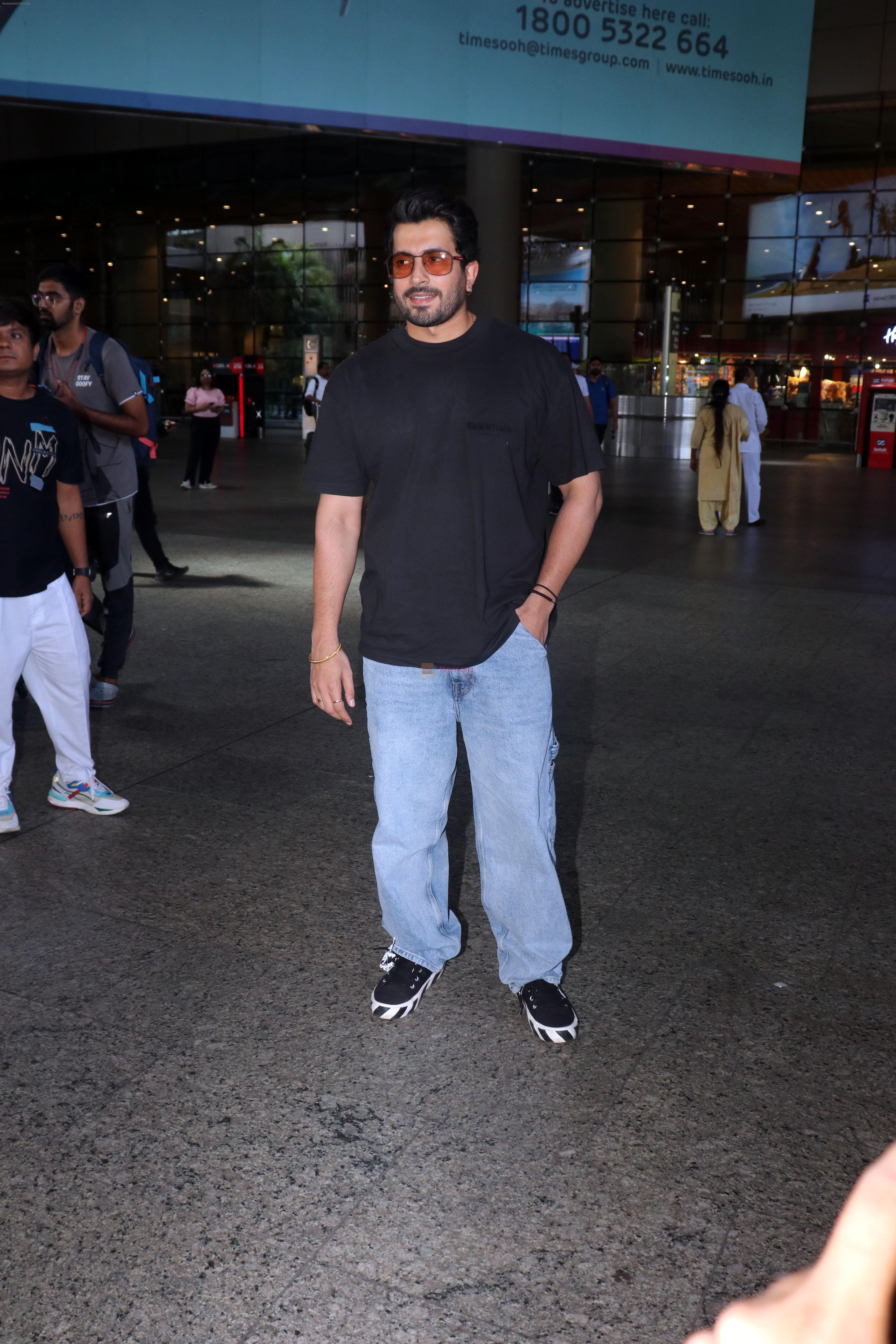 Sunny Singh dressed in jeans pant and slate colored t-shirt