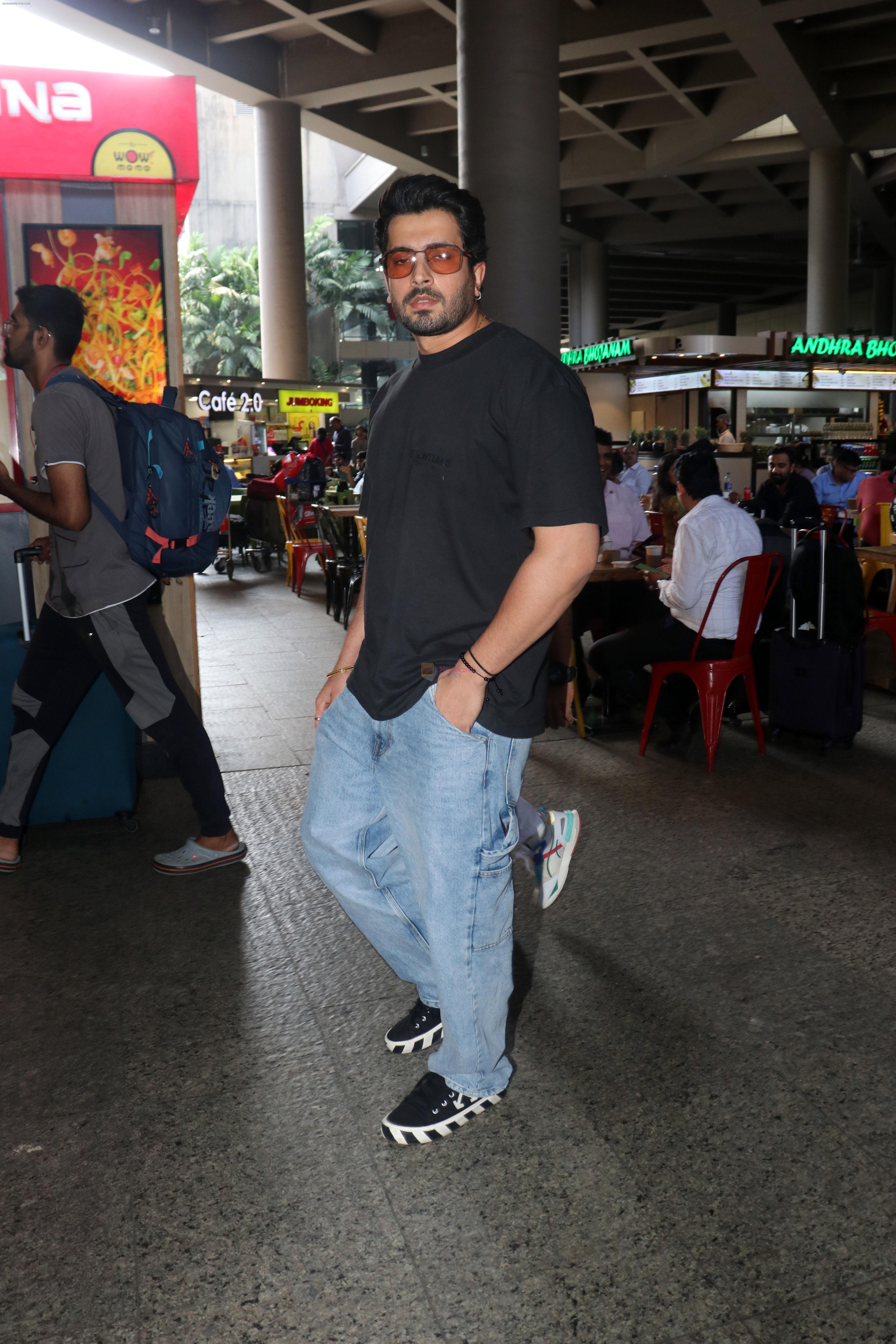 Sunny Singh dressed in jeans pant and slate colored t-shirt