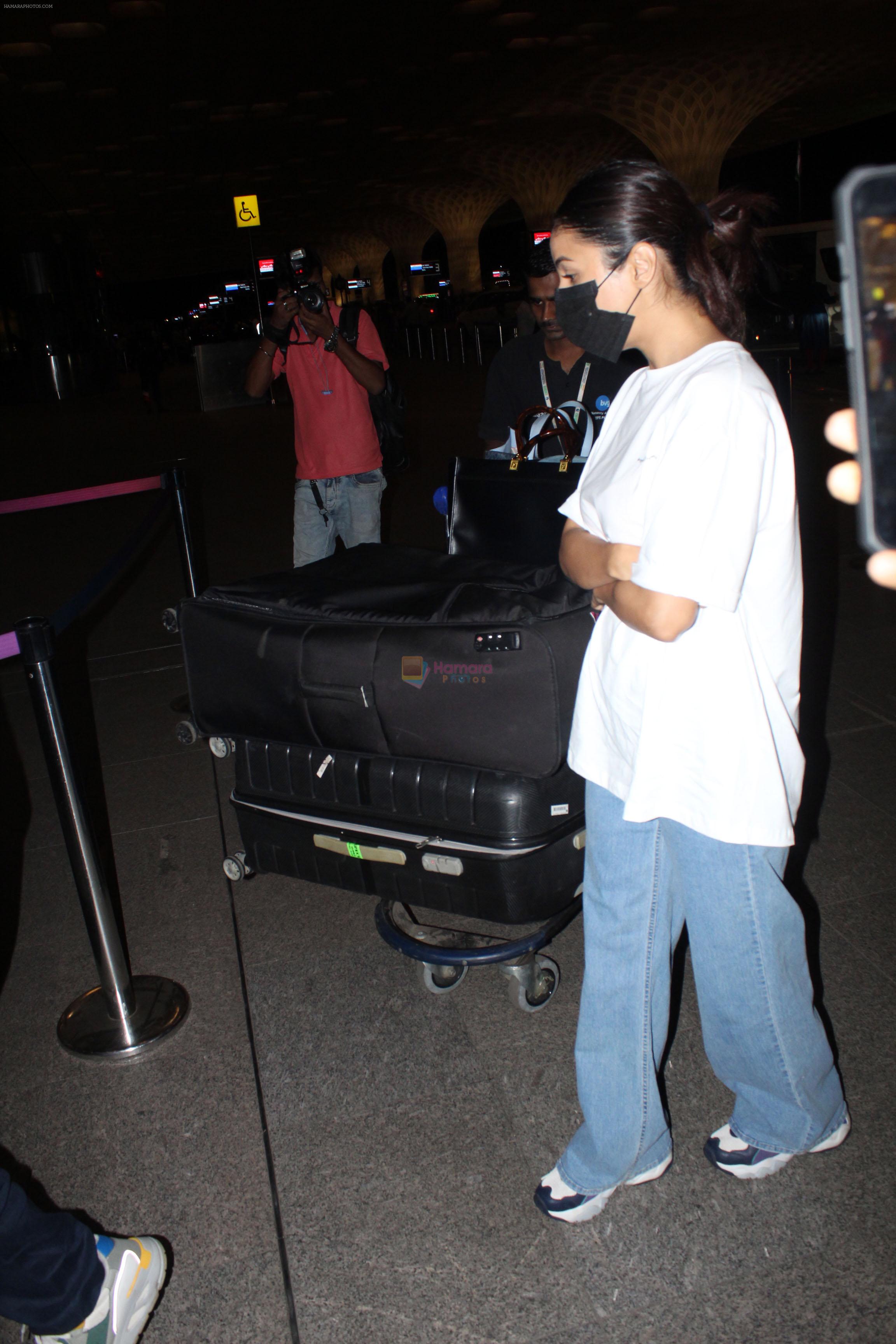 Shehnaaz Kaur Gill wearing white t-shirt and blue jeans spotted at airport on 14 Jun 2023