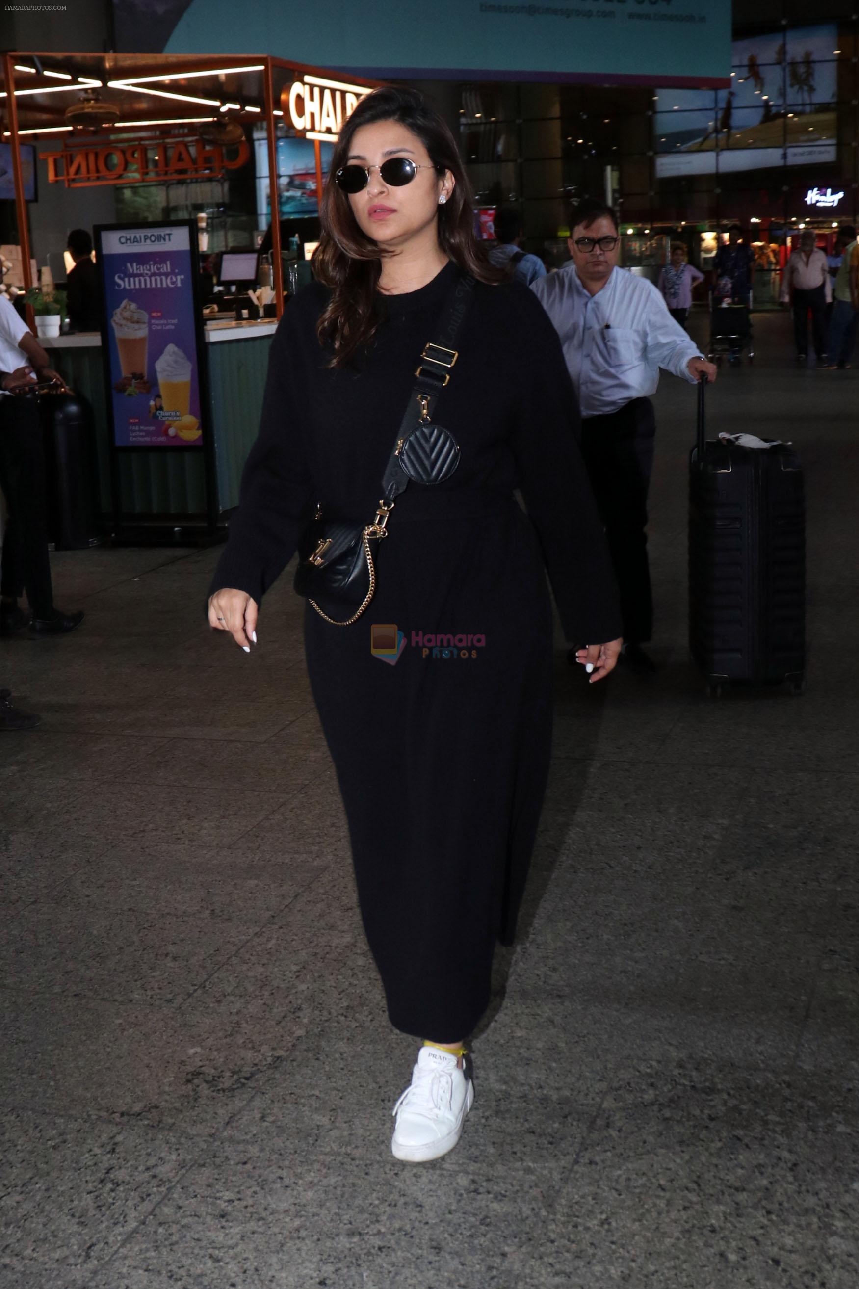 Parineeti Chopra wearing black dress and white shoes at airport on 16 Jun 2023