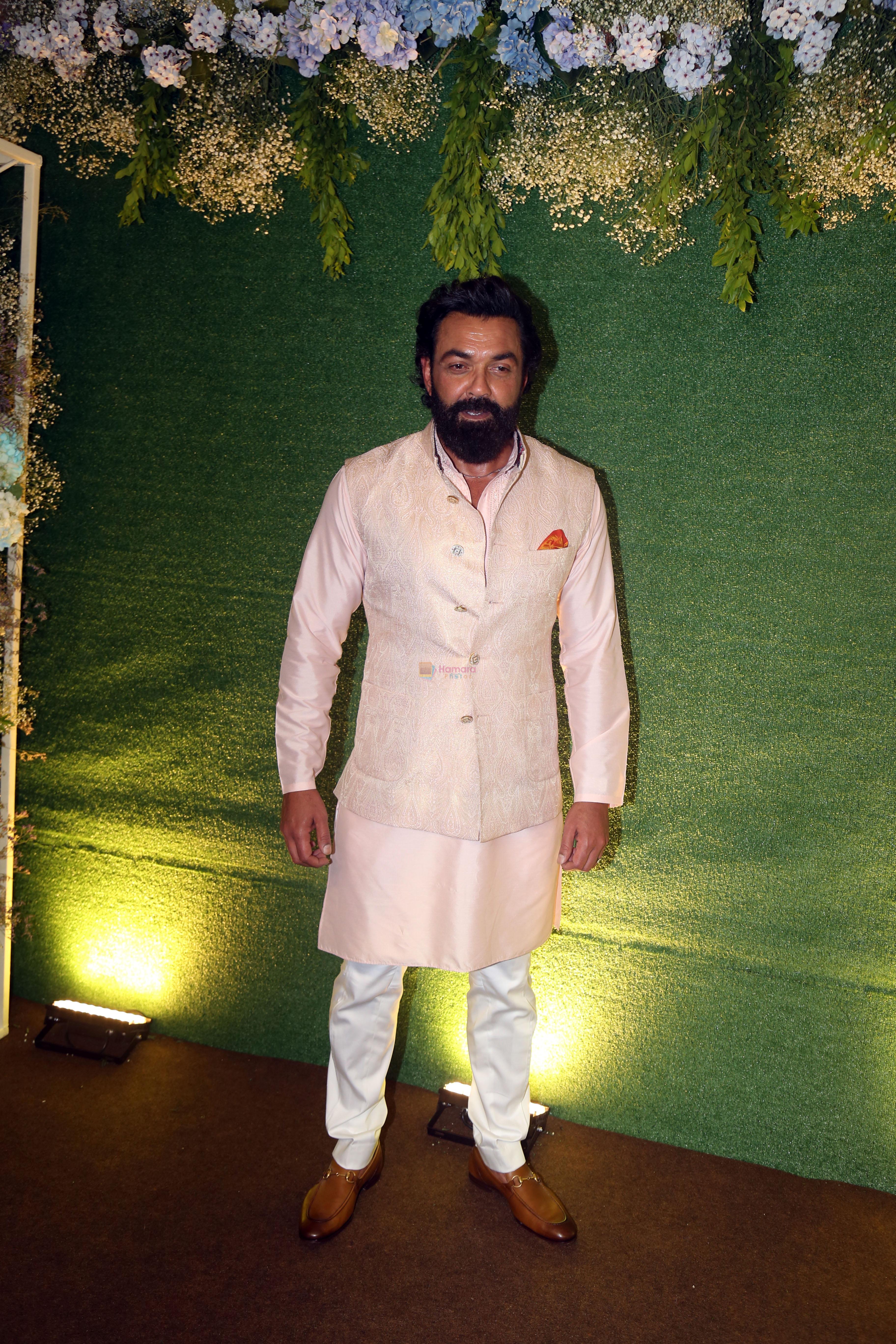 Bobby Deol pose for camera after the sangeet function on 16 Jun 2023