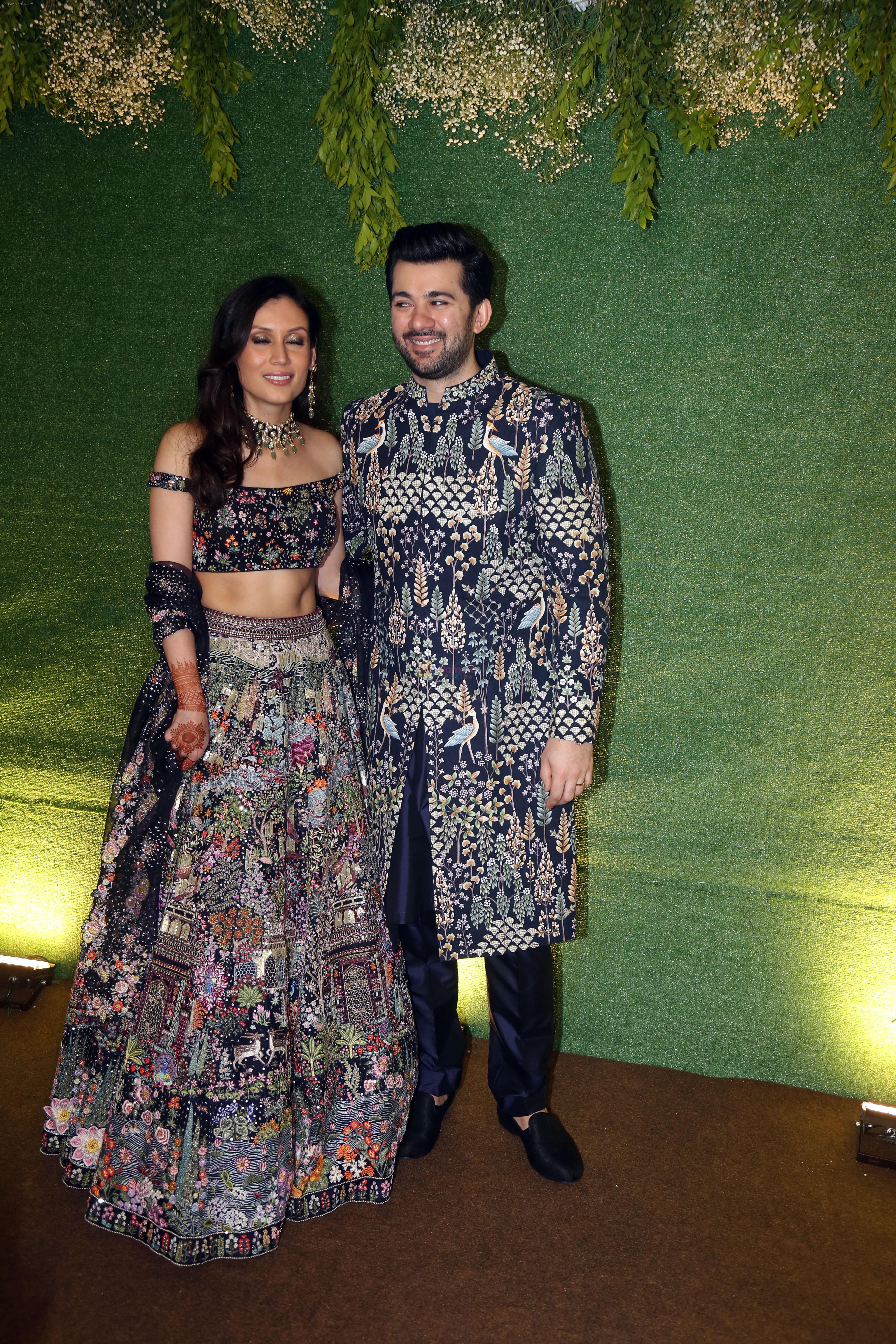 Karan Deol and Drisha Acharya pose for camera after the sangeet function on 16 Jun 2023