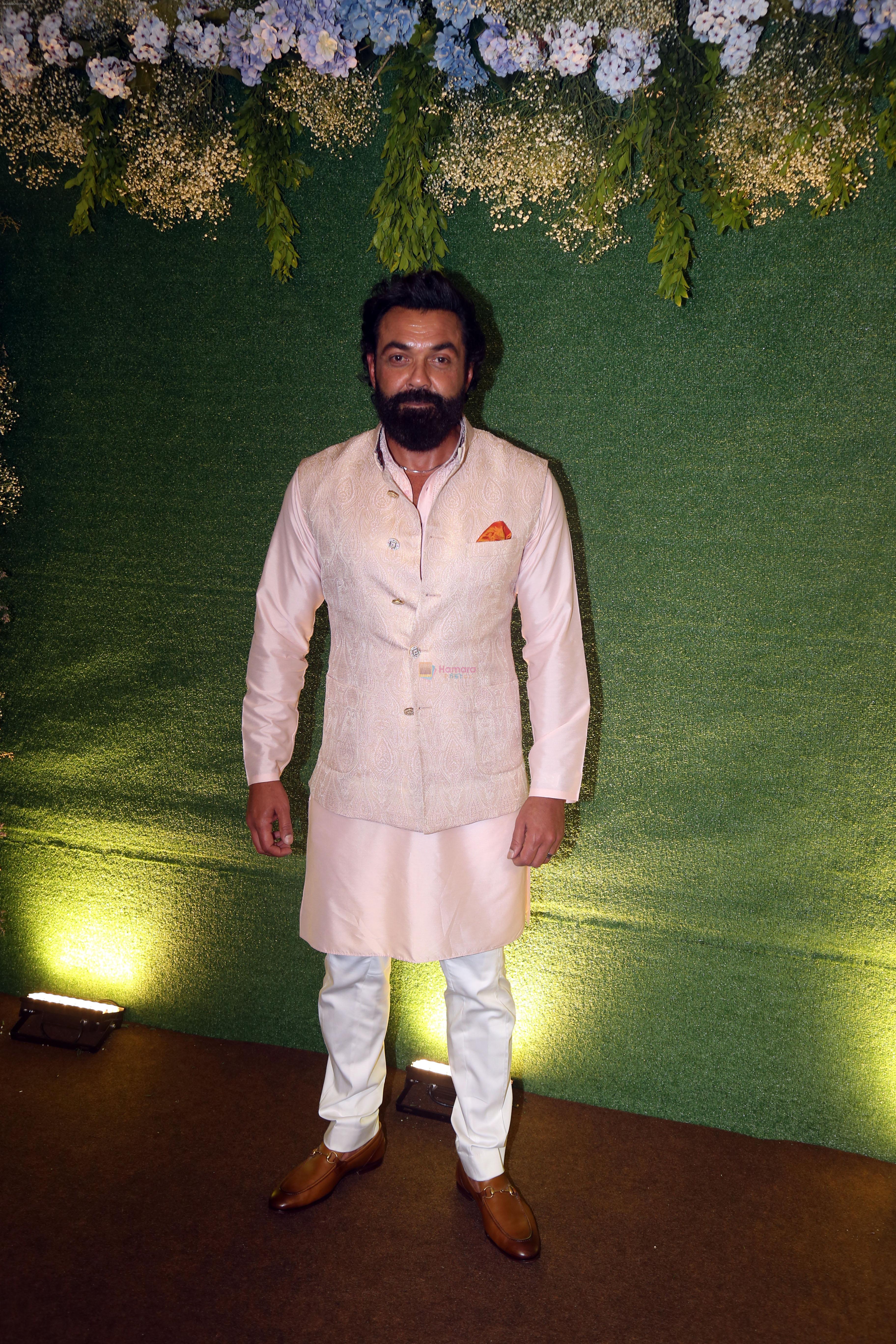 Bobby Deol pose for camera after the sangeet function on 16 Jun 2023
