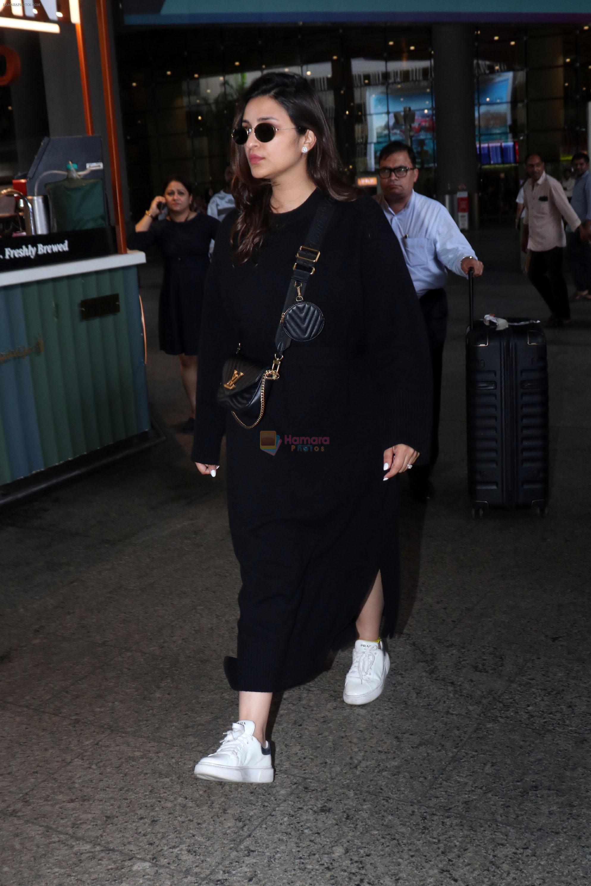 Parineeti Chopra wearing black dress and white shoes at airport on 16 Jun 2023