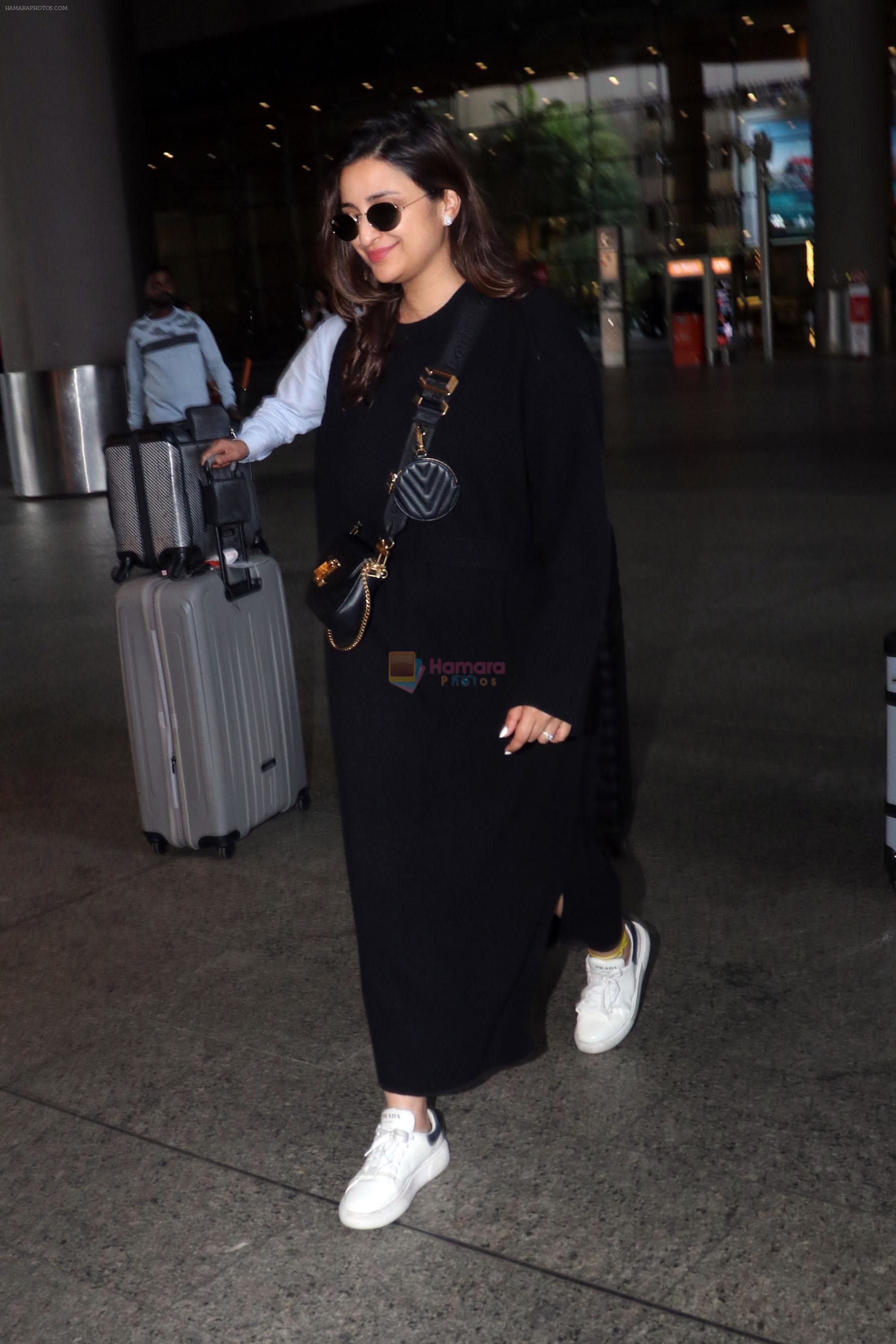 Parineeti Chopra wearing black dress and white shoes at airport on 16 Jun 2023