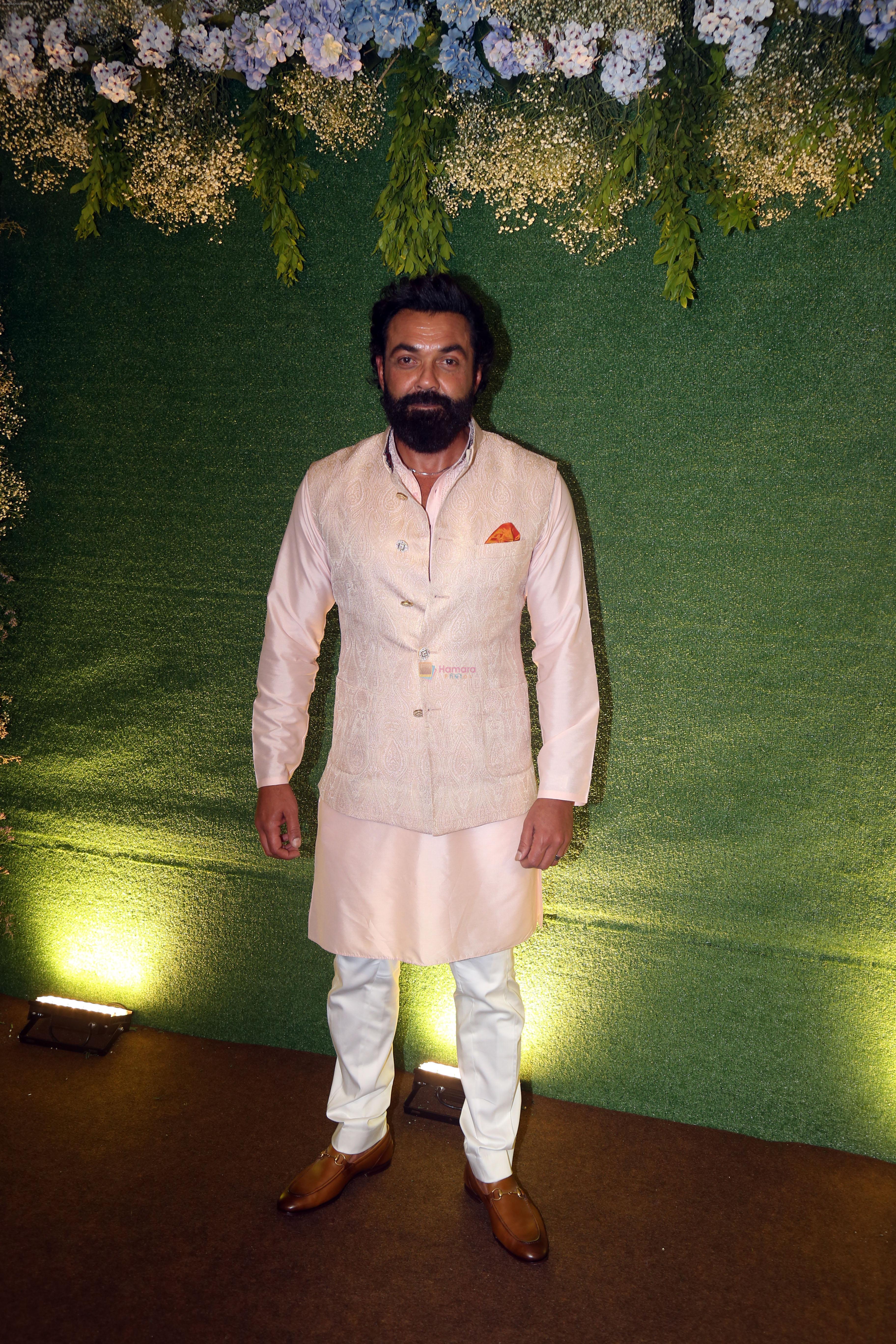 Bobby Deol pose for camera after the sangeet function on 16 Jun 2023