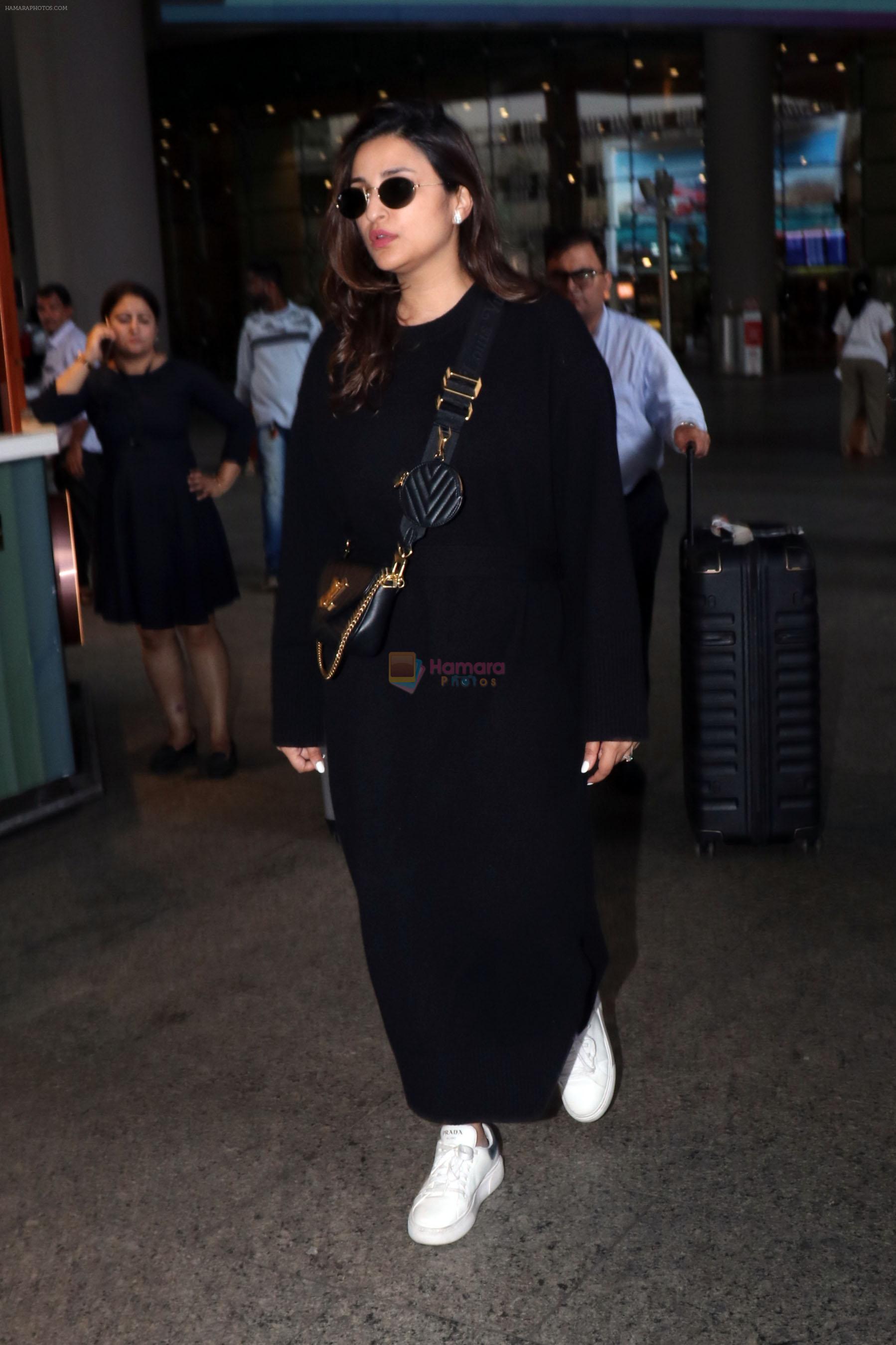 Parineeti Chopra wearing black dress and white shoes at airport on 16 Jun 2023