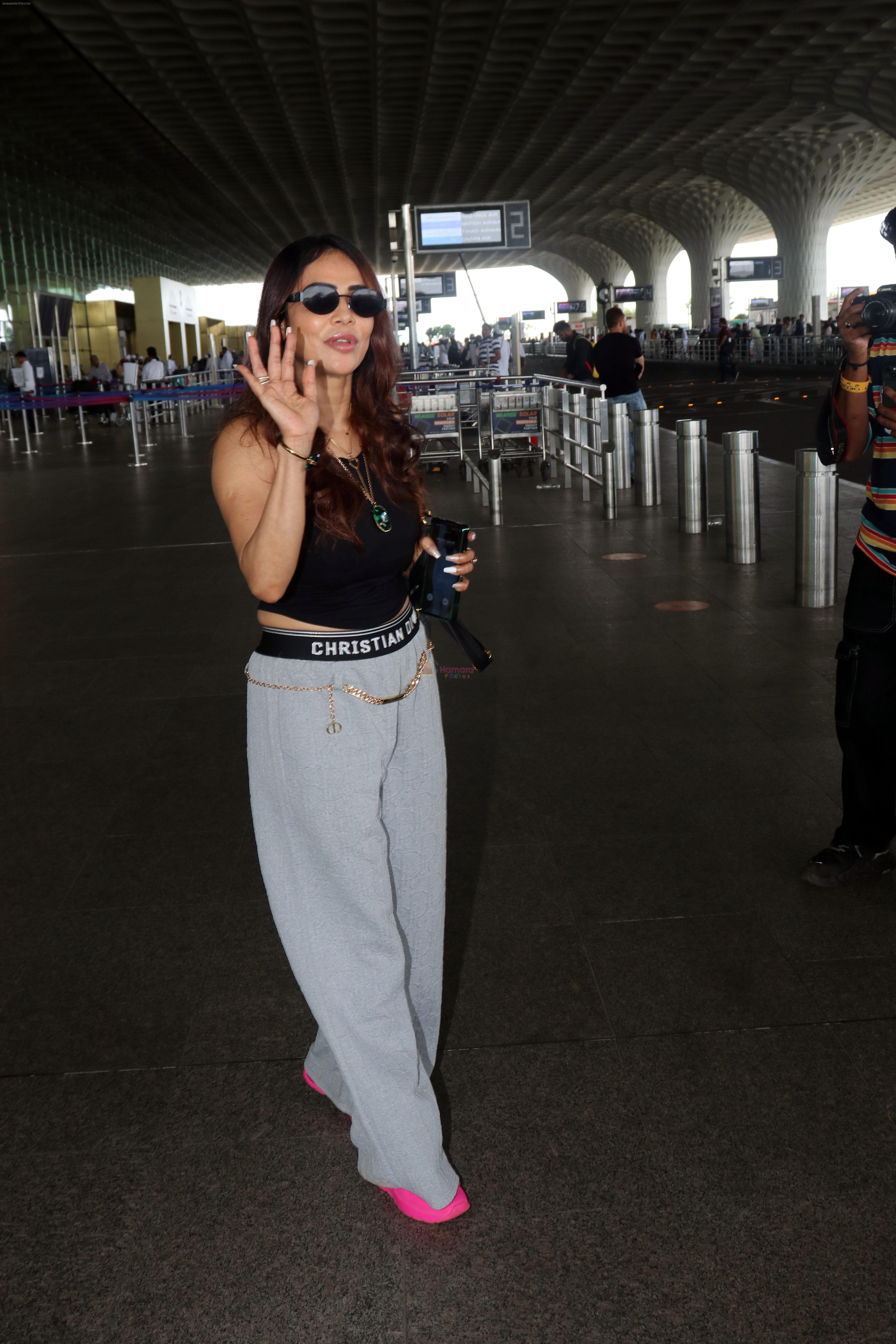 Nikita Rawal dressed in sleeveless top and sweat pant seen at the airport on 17 Jun 2023