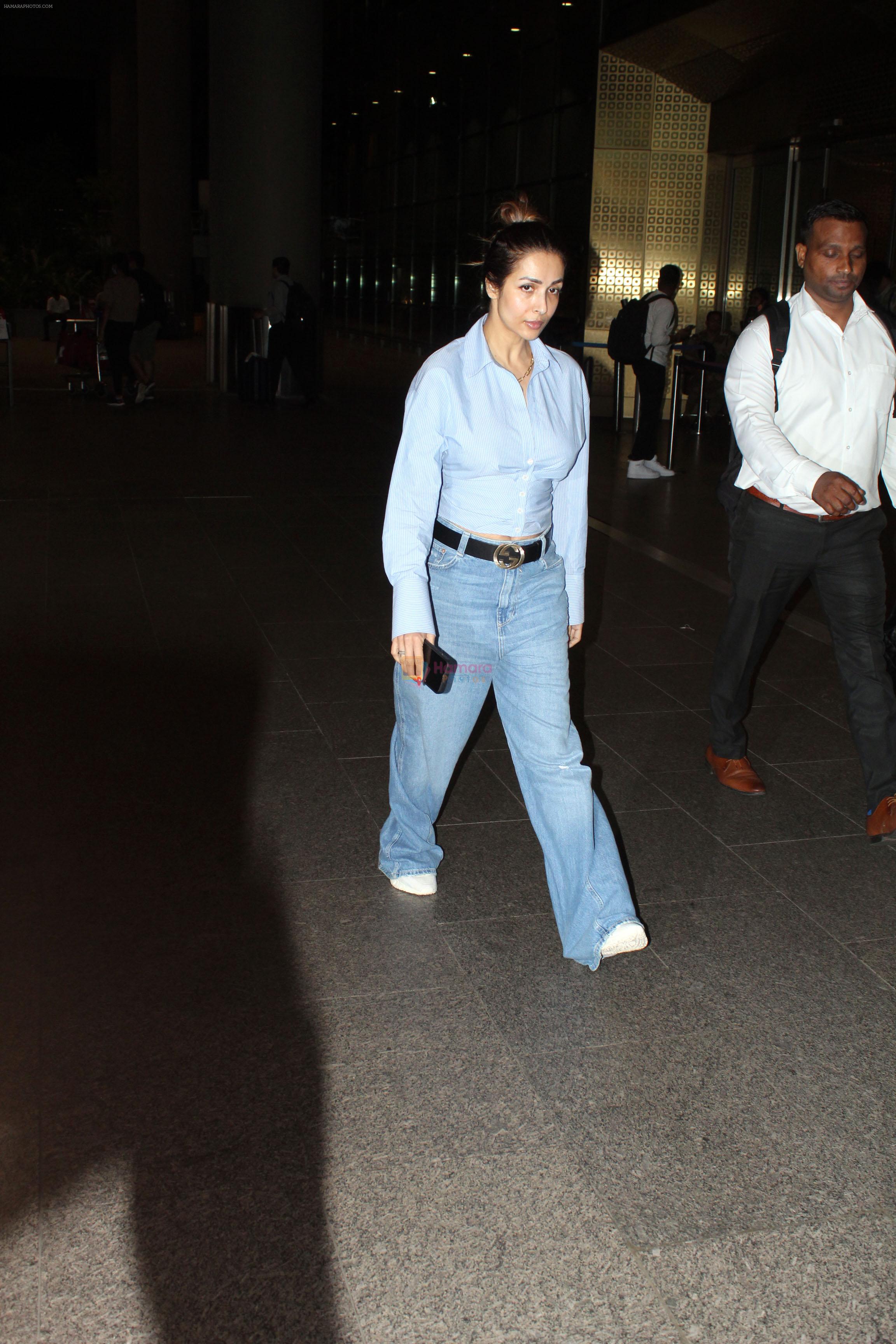 Malaika Arora dressed in blue shirt and pant seen at the airport on 16 Jun 2023
