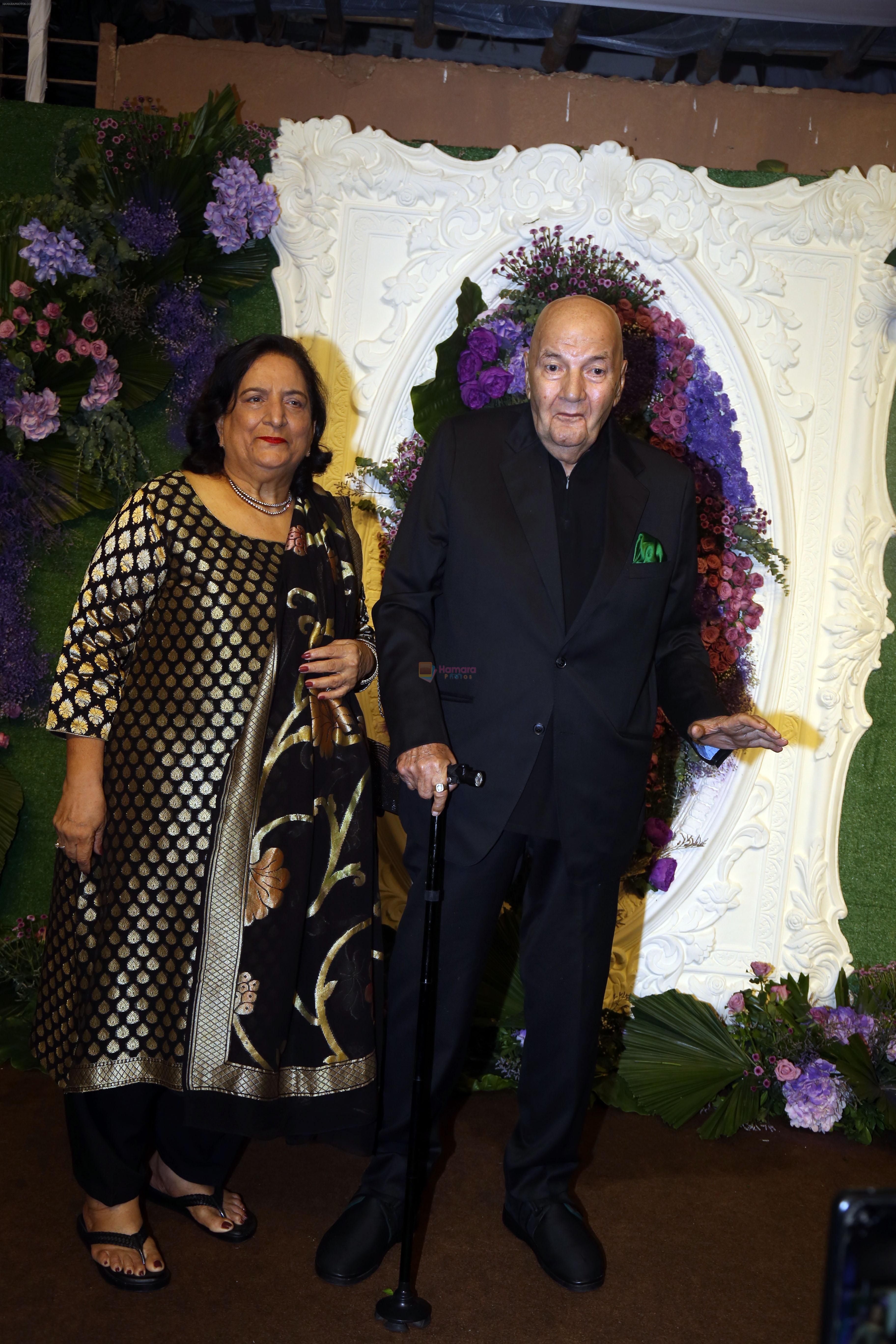 Prem Chopra with wife Uma Chopra Pose for media at the reception of Karan Deol and Drisha Acharya on 18 Jun 2023